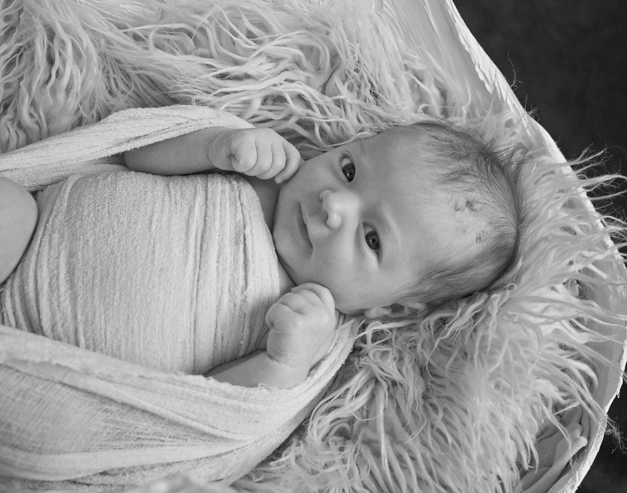 Scarlett is registered to the contest to win money with this photo: baby, cheek, child, comfort, eye, eyebrow, eyelash, facial_expression, flash_photography, grass, hand, happy, human_body, iris, lip, monochrome_photography, nose, person, skin, toddler