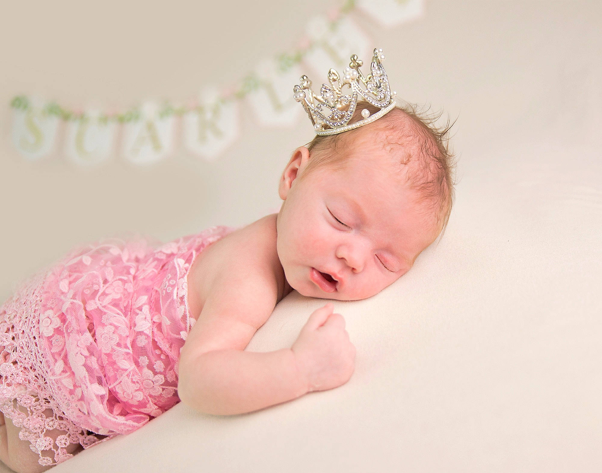 Scarlett is registered to the contest to win money with this photo: baby, baby_toddler_clothing, child, comfort, crown, embellishment, fashion_accessory, finger, flash_photography, hair_accessory, happy, headband, headgear, headpiece, jewellery, pattern, person, skin, sleeve, tiara