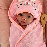 Sofia participe au concours pour gagner de l'argent avec cette photo : adorable, baby, blanket, child, closeup, cozy, cute, eyes, face, hood, indoors, infant, personalized, pink, portrait, resting, soft, towel, wooden_brush, wrapped