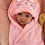 adorable, baby, blanket, child, closeup, cozy, cute, eyes, face, hood, indoors, infant, personalized, pink, portrait, resting, soft, towel, wooden_brush, wrapped