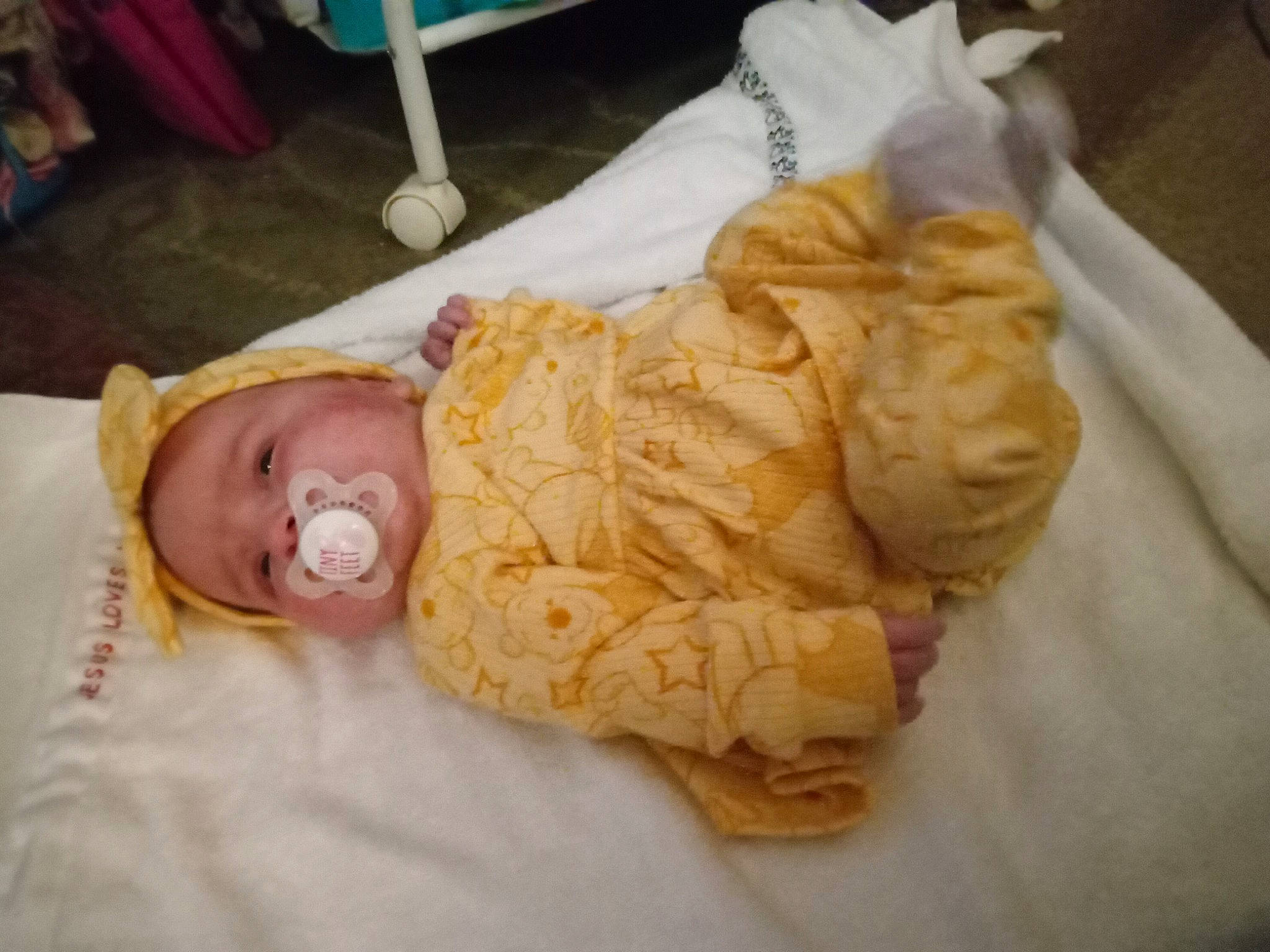 Harlynn is registered to the contest to win money with this photo: abdomen, baby, baby_toddler_clothing, child, comfort, food, head, human_body, peach, person, room, toddler