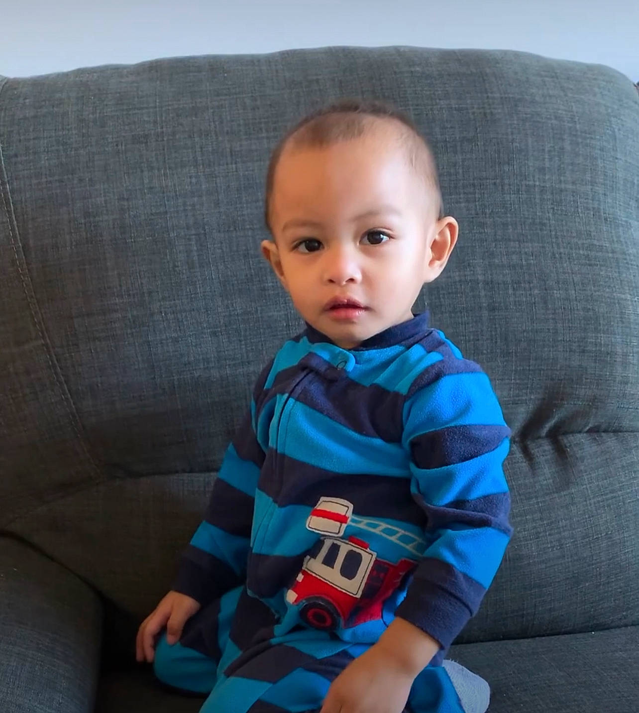 Ezekiel Fernando joined the competition — help win amazing prizes! baby, baby_toddler_clothing, cheek, child, comfort, couch, electric_blue, eye, face, facial_expression, hairstyle, head, person, product, sitting, skin, sleeve, standing, t_shirt, textile