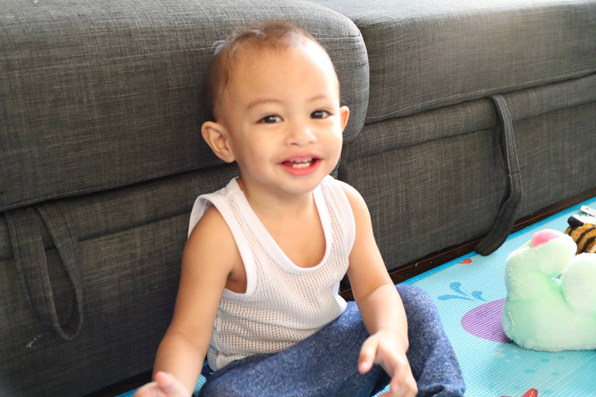 Ezekiel Fernando is registered to the contest to win money with this photo: baby, baby_toddler_clothing, chair, cheek, child, comfort, couch, eye, flash_photography, flooring, fun, happy, iris, joy, pattern, person, sitting, skin, sleeve, smile