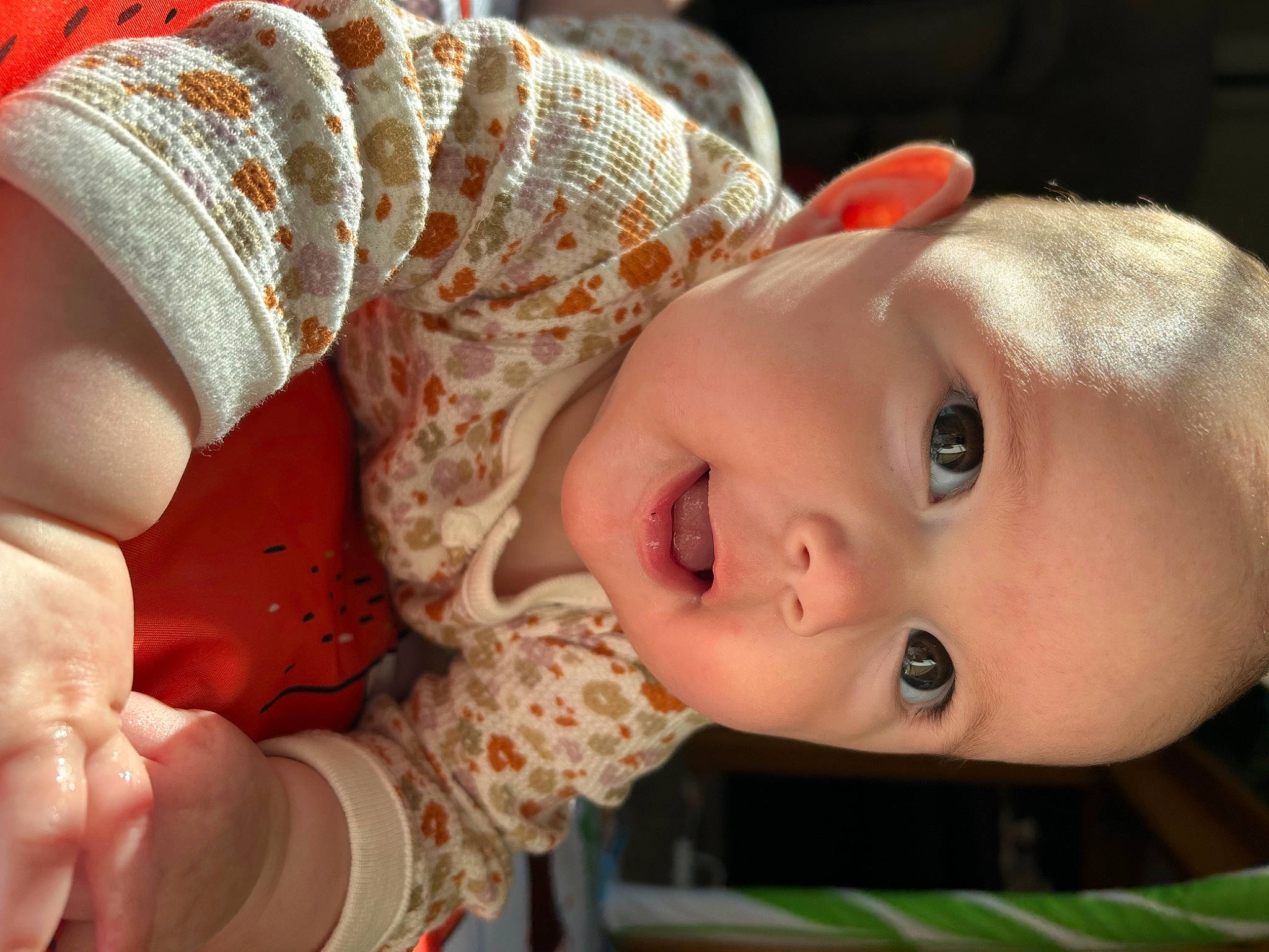 Alaïa is registered to the contest to win money with this photo: brown_hair, cheek, child, eye, eyelash, happy, hat, headgear, iris, lip, nail, neck, nose, person, skin, smile, textile, toddler, toy, wood