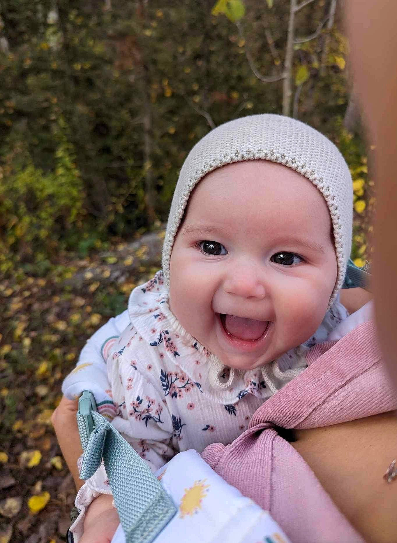 Alaïa is registered to the contest to win money with this photo: baby, baby_products, baby_toddler_clothing, cap, child, face, fashion_accessory, fun, grass, happy, headgear, headwear, joy, laugh, leisure, lip, people_in_nature, person, recreation, sitting