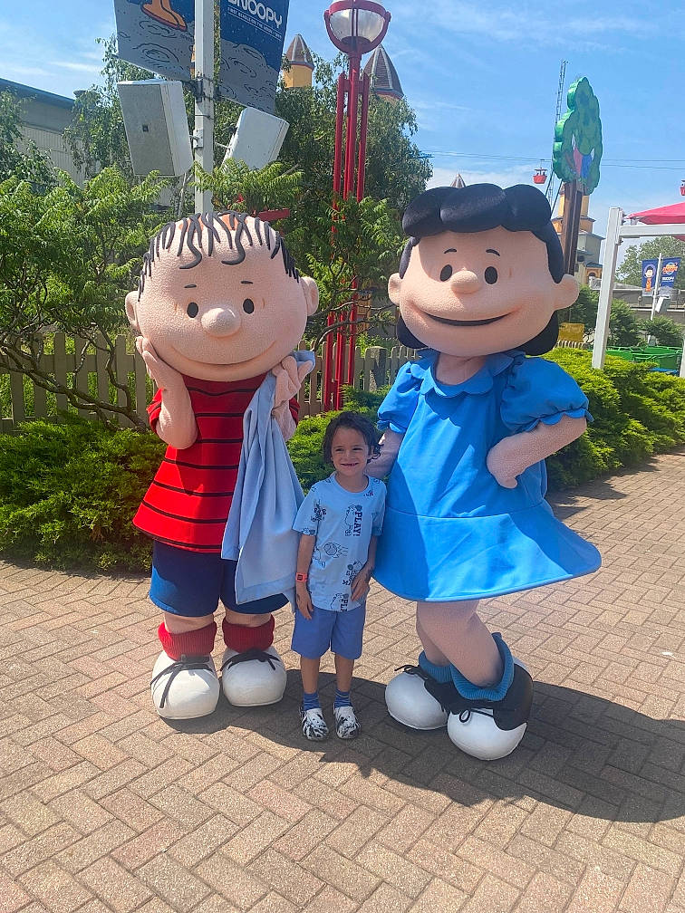 Emilio joined the competition — help win amazing prizes! child, event, fictional_character, footwear, fun, gesture, grass, happy, joy, leisure, mascot, person, plant, pole, recreation, shorts, sky, smile, tourism, travel