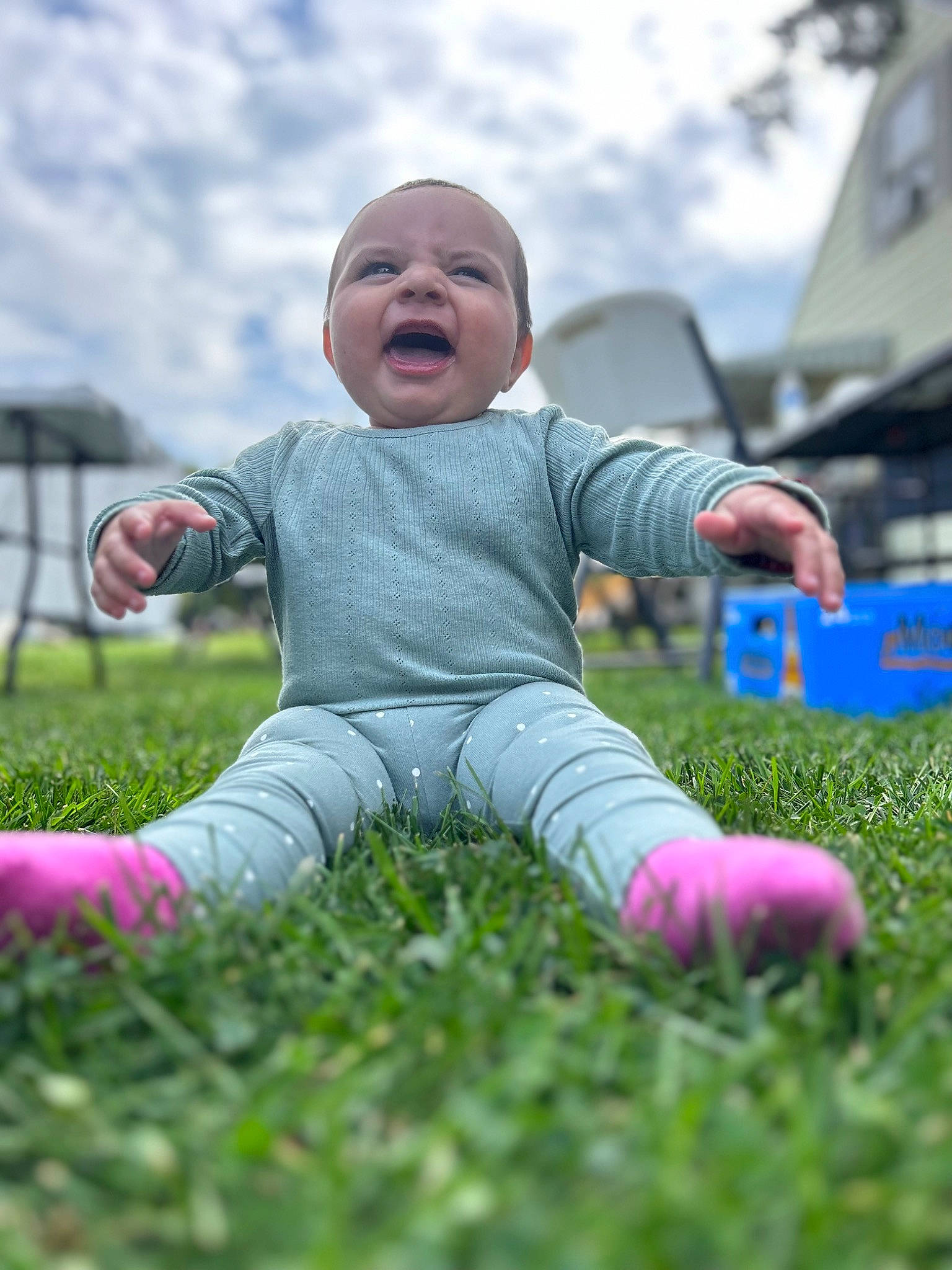 Ariana joined the competition — help win amazing prizes! baby, baby_toddler_clothing, child, cloud, face, flash_photography, fun, grass, grass_family, grassland, happy, landscape, leisure, people_in_nature, person, plant, recreation, sitting, sky, smile