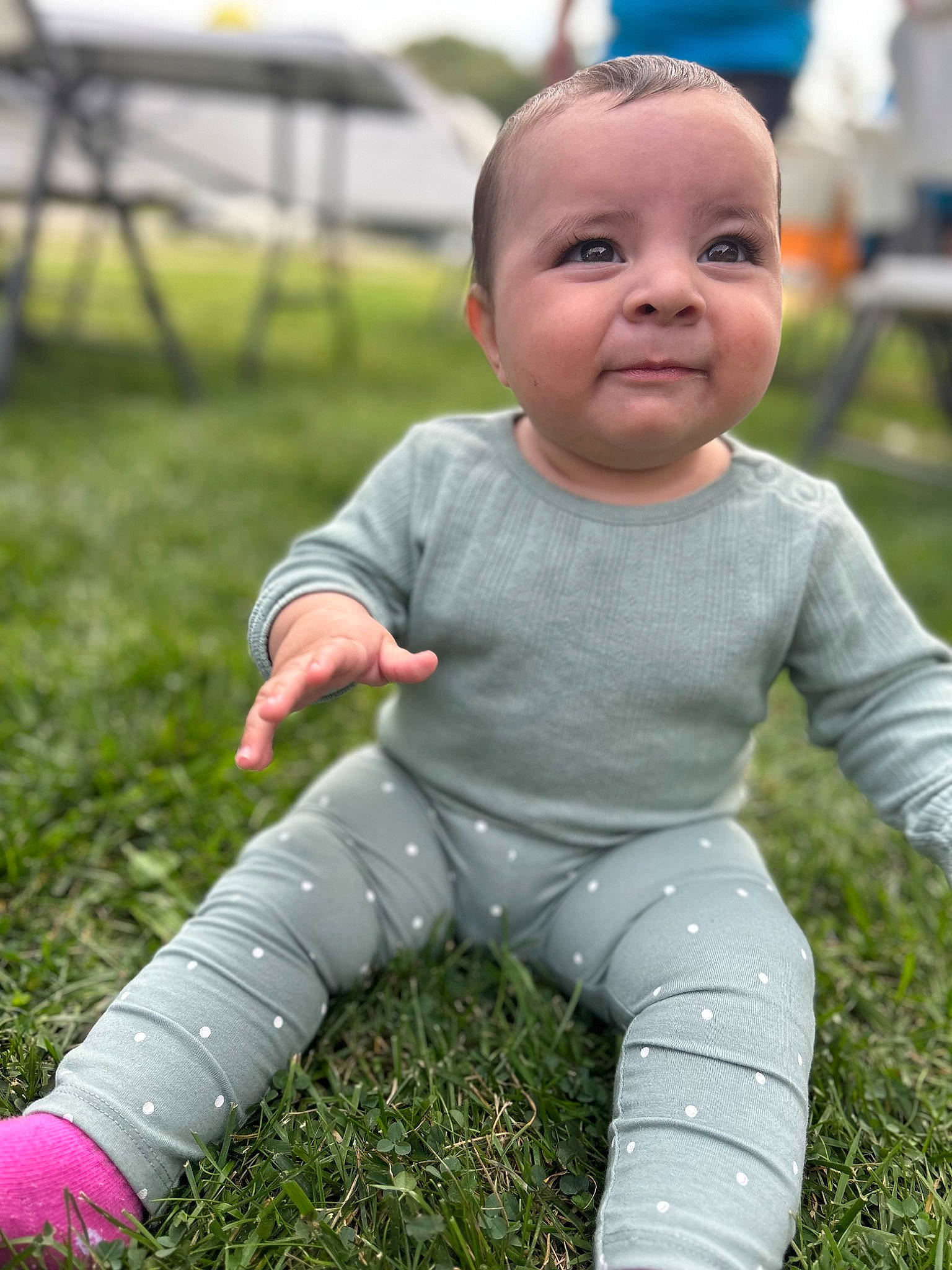 Ariana joined the competition — help win amazing prizes! baby, baby_toddler_clothing, chair, cheek, child, finger, fun, garden, grass, happy, leaf, leisure, people_in_nature, person, plant, recreation, sitting, skin, sleeve, smile