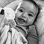 Ariella is registered to the contest to win money with this photo: baby, blanket, child, closeup, clothing, comfort, couch, cute, eyelashes, fabric, face, hand, happy, infant, nail_polish, plush_toy, portrait, smiling, soft, texture