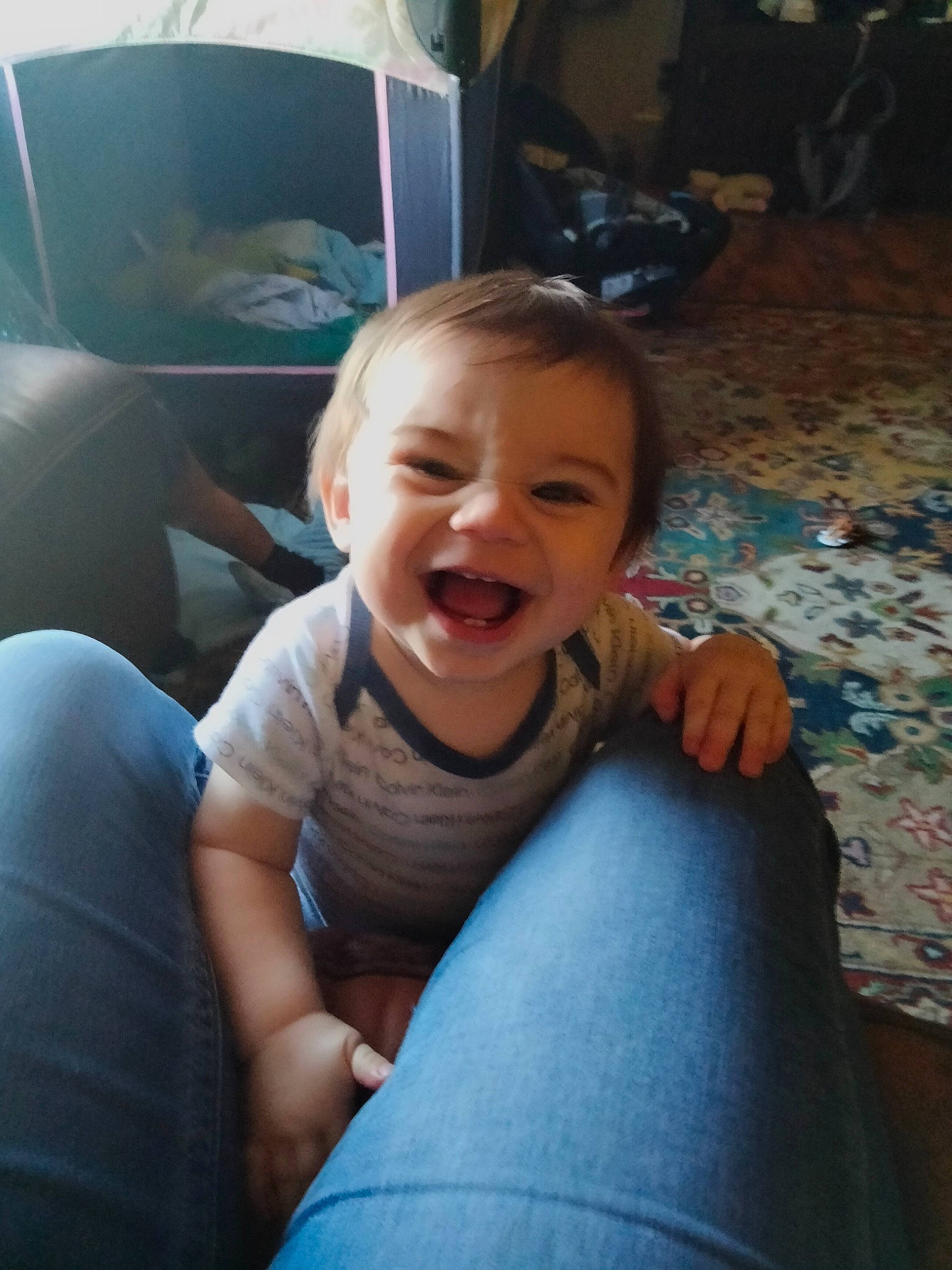 Cash is registered to the contest to win money with this photo: blue, cheek, child, comfort, eye, finger, flooring, fun, hairstyle, happy, head, joint, leisure, mouth, person, shoulder, sitting, skin, smile, thumb