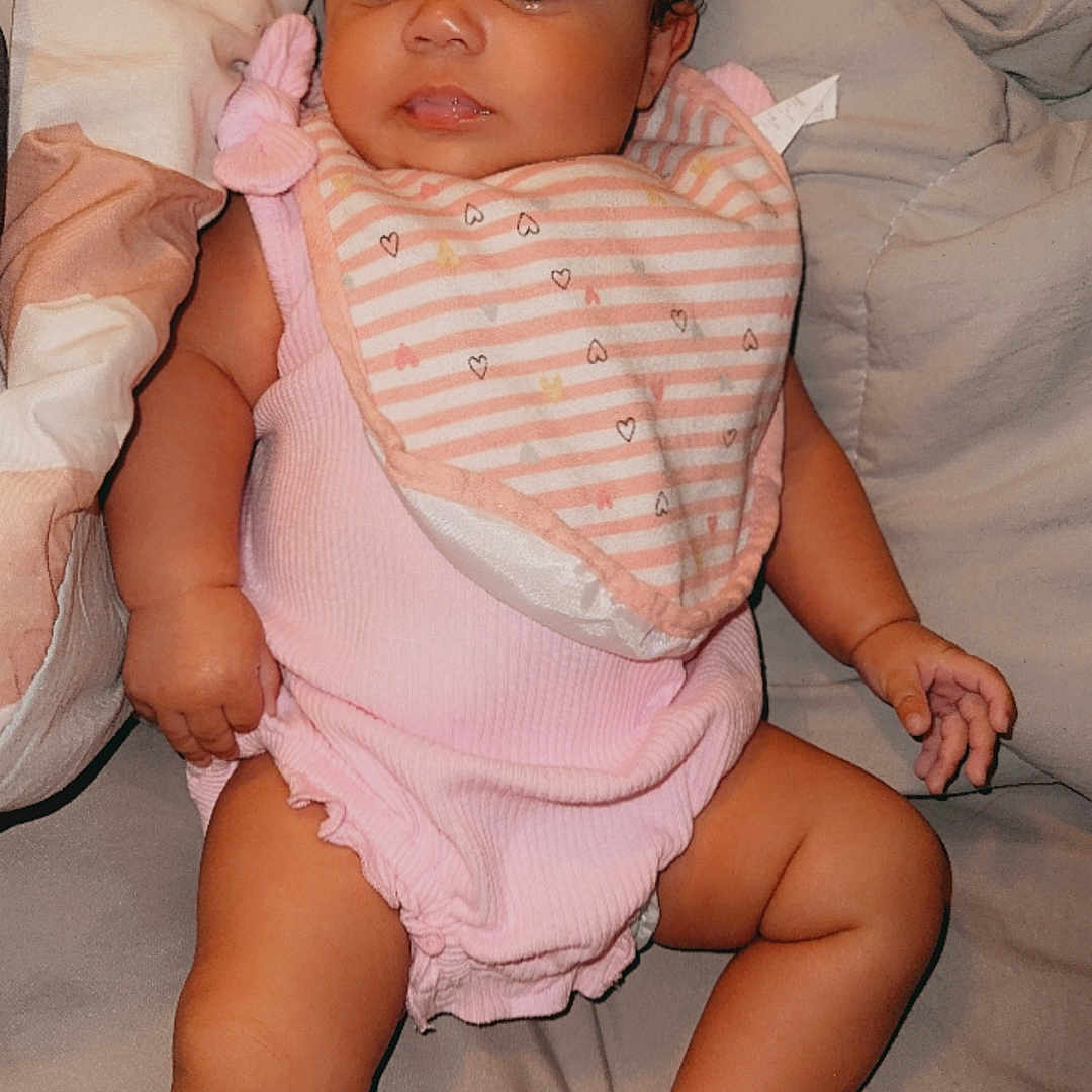 Taliyah joined the competition — help win amazing prizes! baby, bodypart, bonnet, clothing, couch, face, finger, footwear, furniture, hand, hat, head, newborn, person, photography, portrait, sandal, shoe, sitting, sneaker