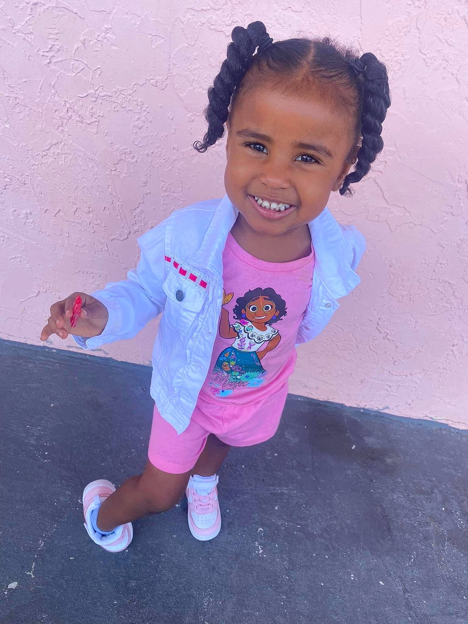 Amia joined the competition — help win amazing prizes! baby_toddler_clothing, cheek, child, electric_blue, flip_flops, fun, hairstyle, happy, joy, magenta, pattern, person, pink, purple, sandal, shorts, sitting, skin, sleeve, smile
