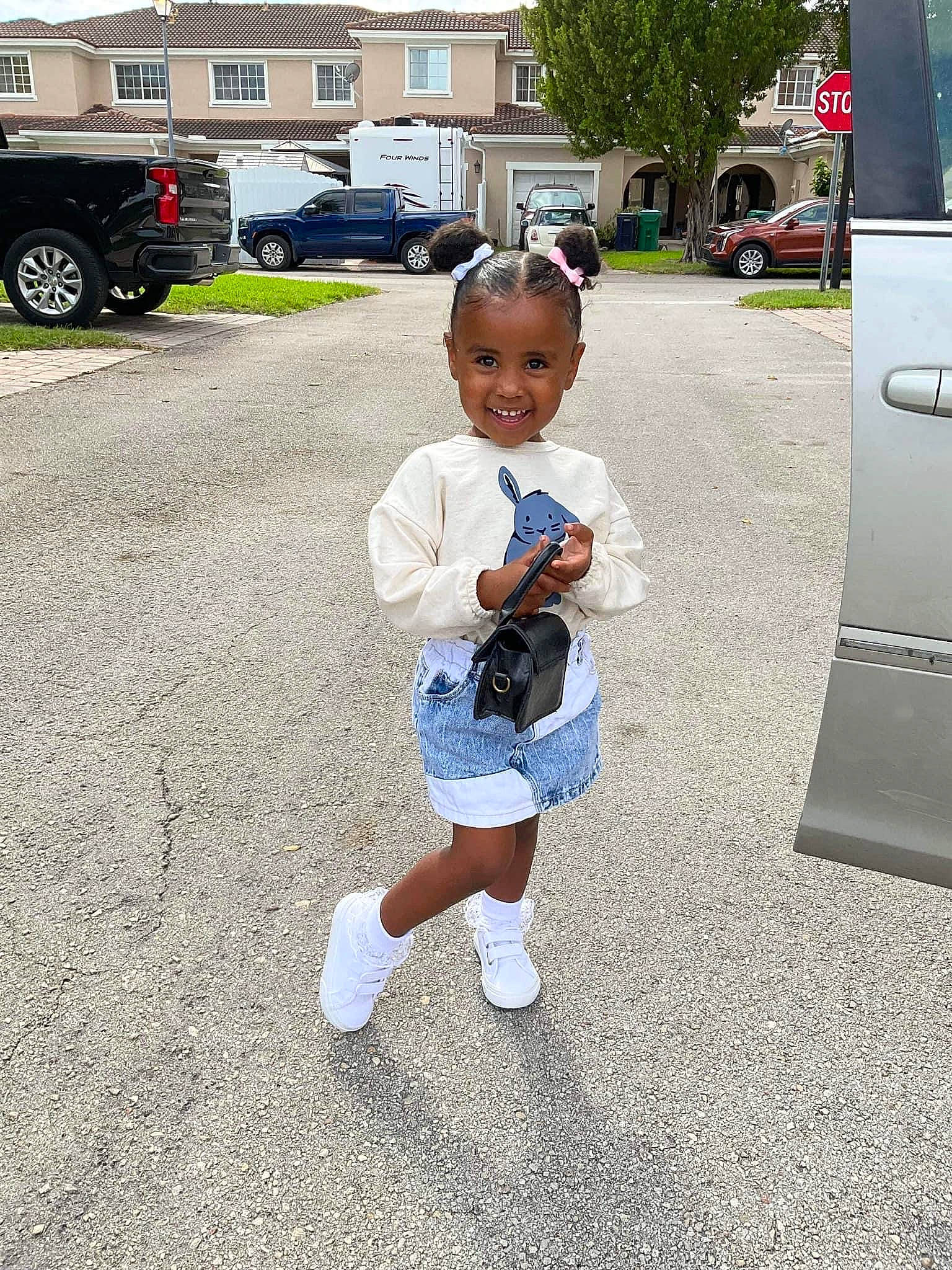 Amia joined the competition — help win amazing prizes! arm, asphalt, baby, car, finger, grass, hand, human_body, joy, land_vehicle, person, plant, road, road_surface, shorts, sidewalk, t_shirt, thigh, tire, tree