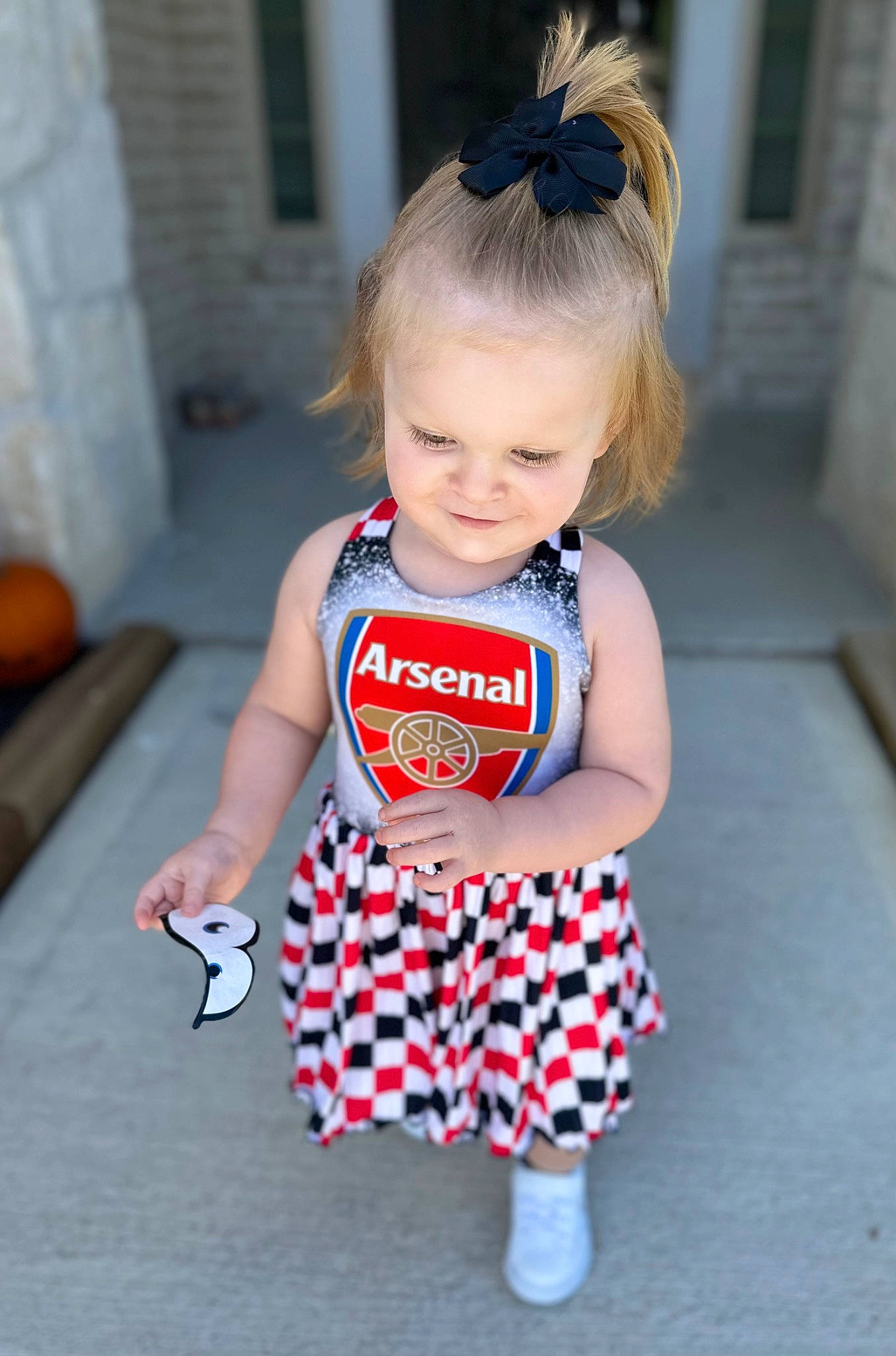 Sophie joined the competition — help win amazing prizes! baby_toddler_clothing, child, clothing, day_dress, door, dress, electric_blue, fun, happy, head, human_leg, pattern, person, pink, sitting, skin, sleeve, standing, t_shirt, toddler