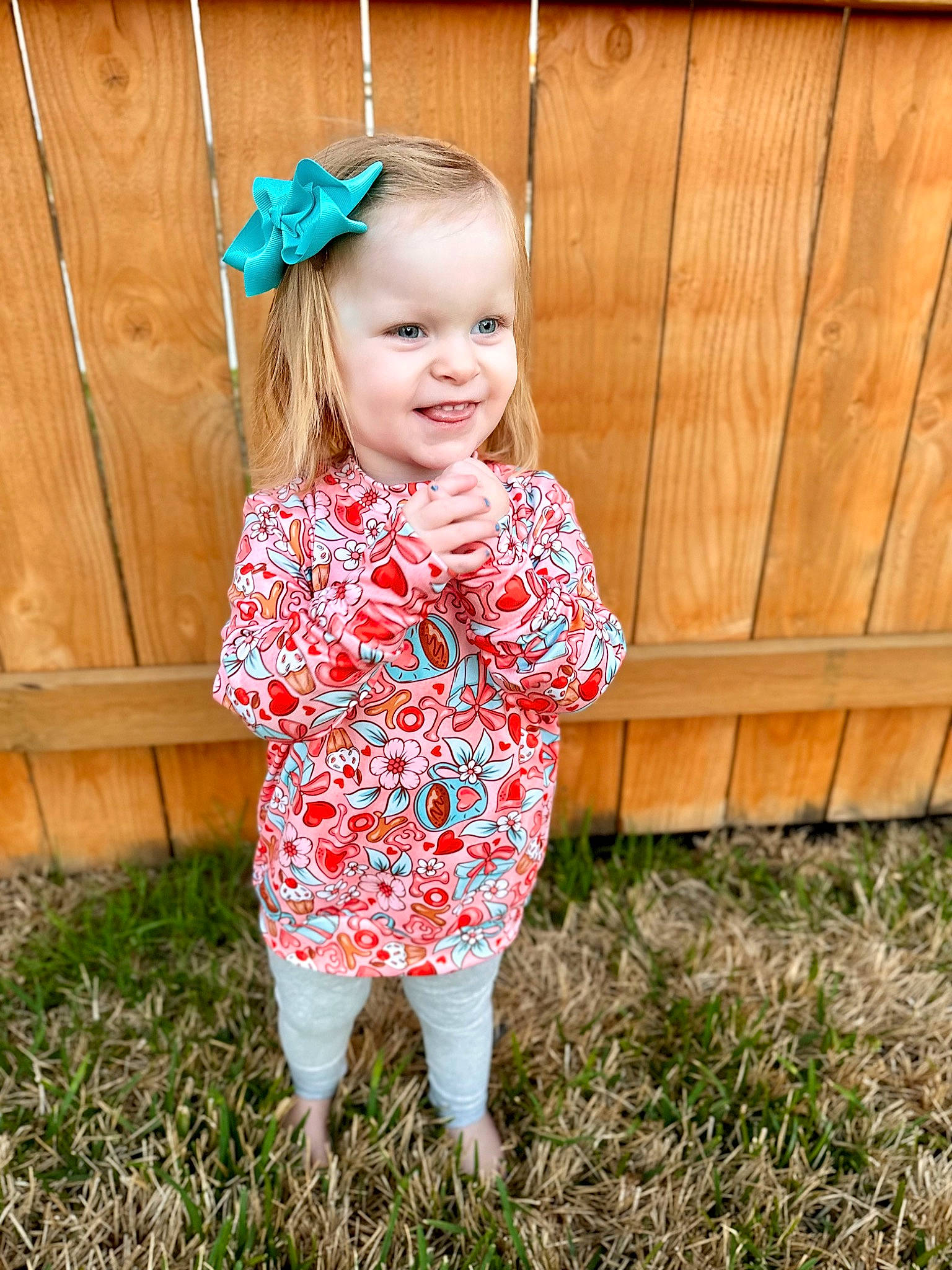 Sophie joined the competition — help win amazing prizes! baby_toddler_clothing, child, clothing, dress, eye, fashion_accessory, fun, grass, happy, hat, head, human_leg, joy, magenta, pattern, people_in_nature, person, plant, sleeve, smile