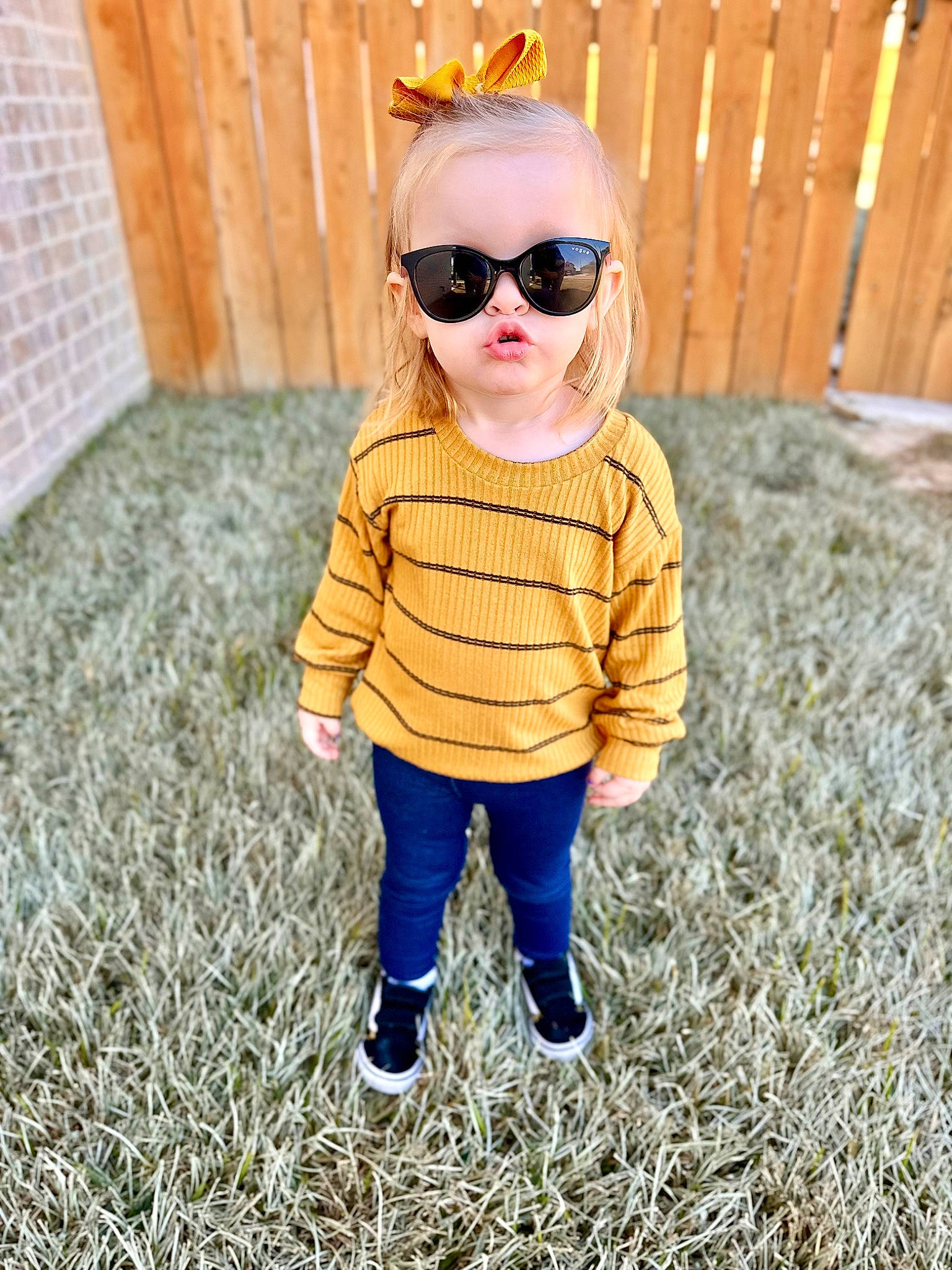 Sophie joined the competition — help win amazing prizes! baby_toddler_clothing, blond, child, eyewear, flooring, glasses, goggles, grass, happy, head, pattern, people_in_nature, person, personal_protective_equipment, plant, sleeve, soil, sunglasses, toddler, tree