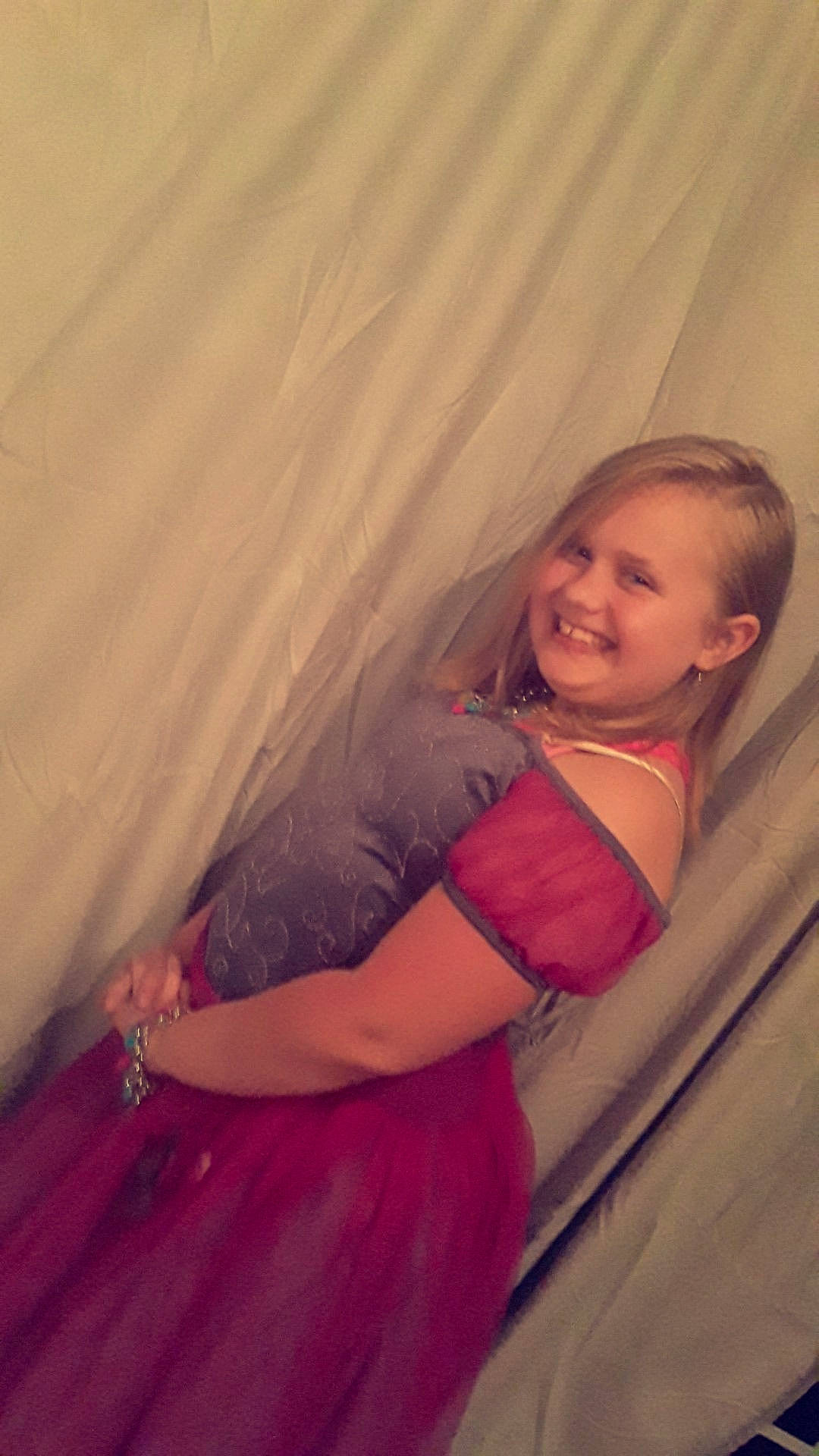 Virginia is registered to the contest to win money with this photo: abdomen, arm, child, fun, iris, joy, long_hair, magenta, person, photography, pink