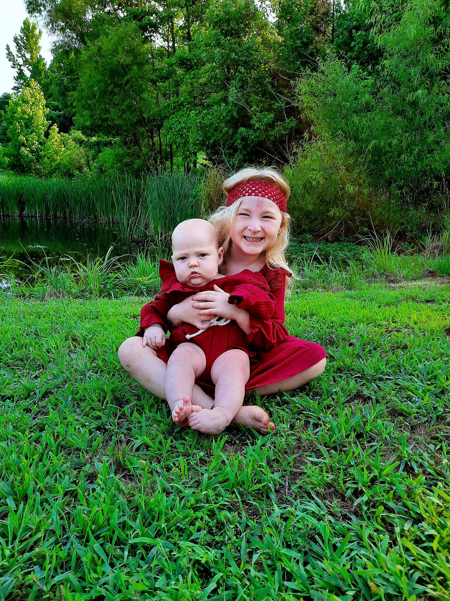 Nova joined the competition — help win amazing prizes! baby, baby_toddler_clothing, grass, grassland, groundcover, happy, hat, headwear, human_body, joy, landscape, lawn, meadow, natural_landscape, people_in_nature, person, plant, prairie, sky, smile