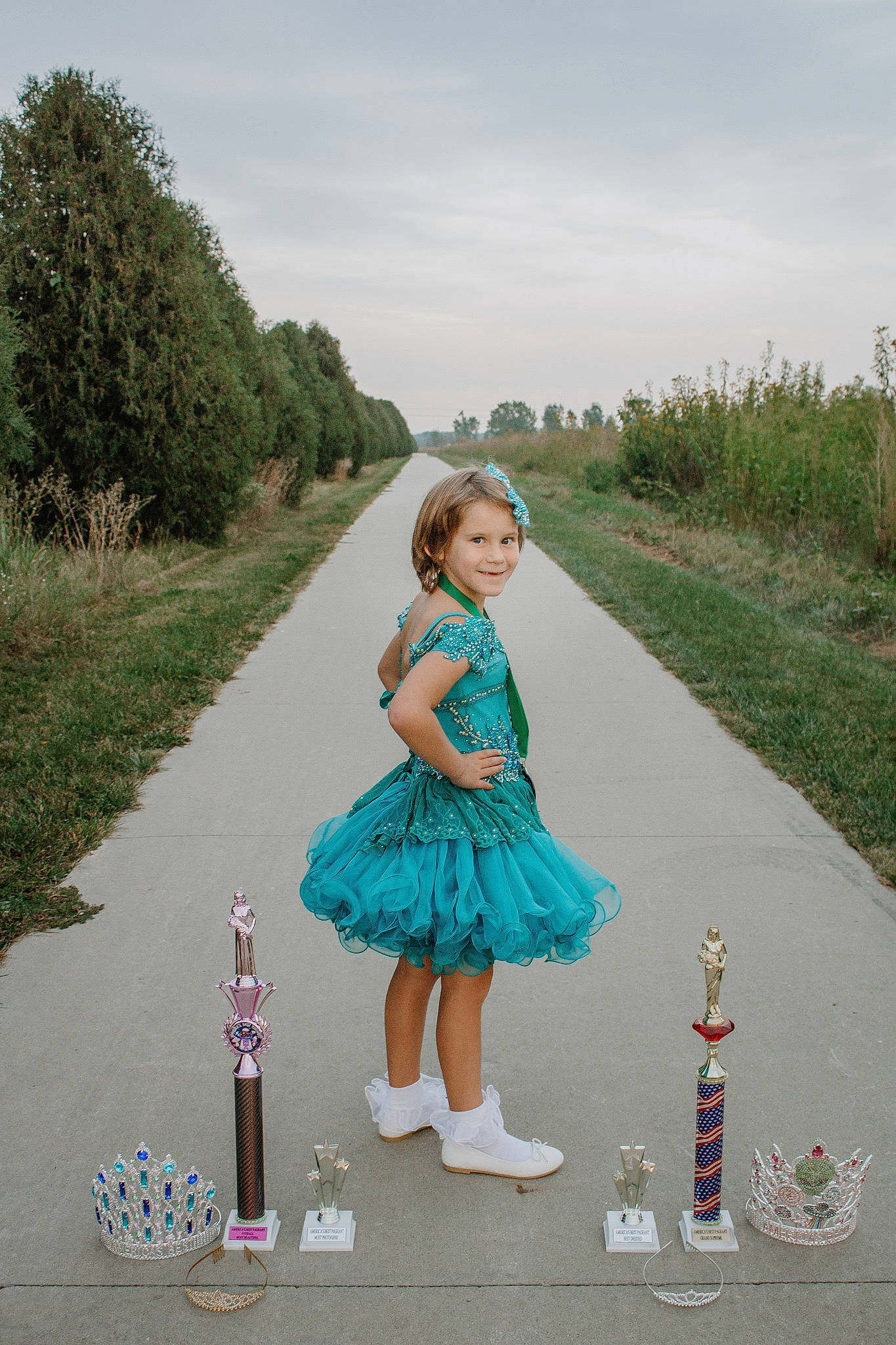 Portlyn joined the competition — help win amazing prizes! asphalt, cloud, cone, dress, electric_blue, event, fun, grass, grass_family, grassland, happy, joy, leisure, person, pink, plant, recreation, road, sky, standing