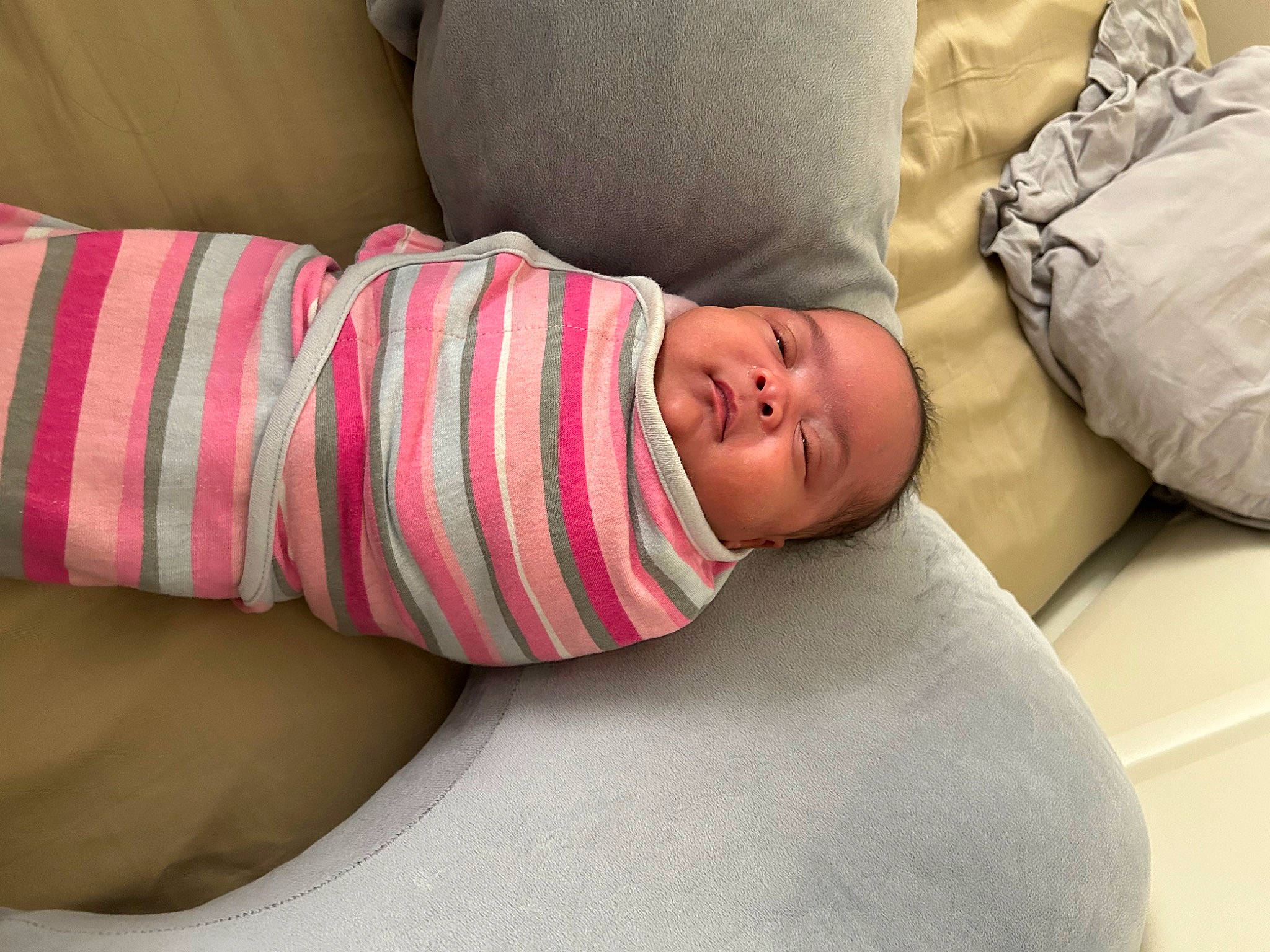 Rhylee joined the competition — help win amazing prizes! arm, baby, baby_products, baby_sleeping, baby_toddler_clothing, child, comfort, couch, elbow, eye, flesh, human_body, human_leg, linens, nail, pattern, person, room, sleep, sleeve