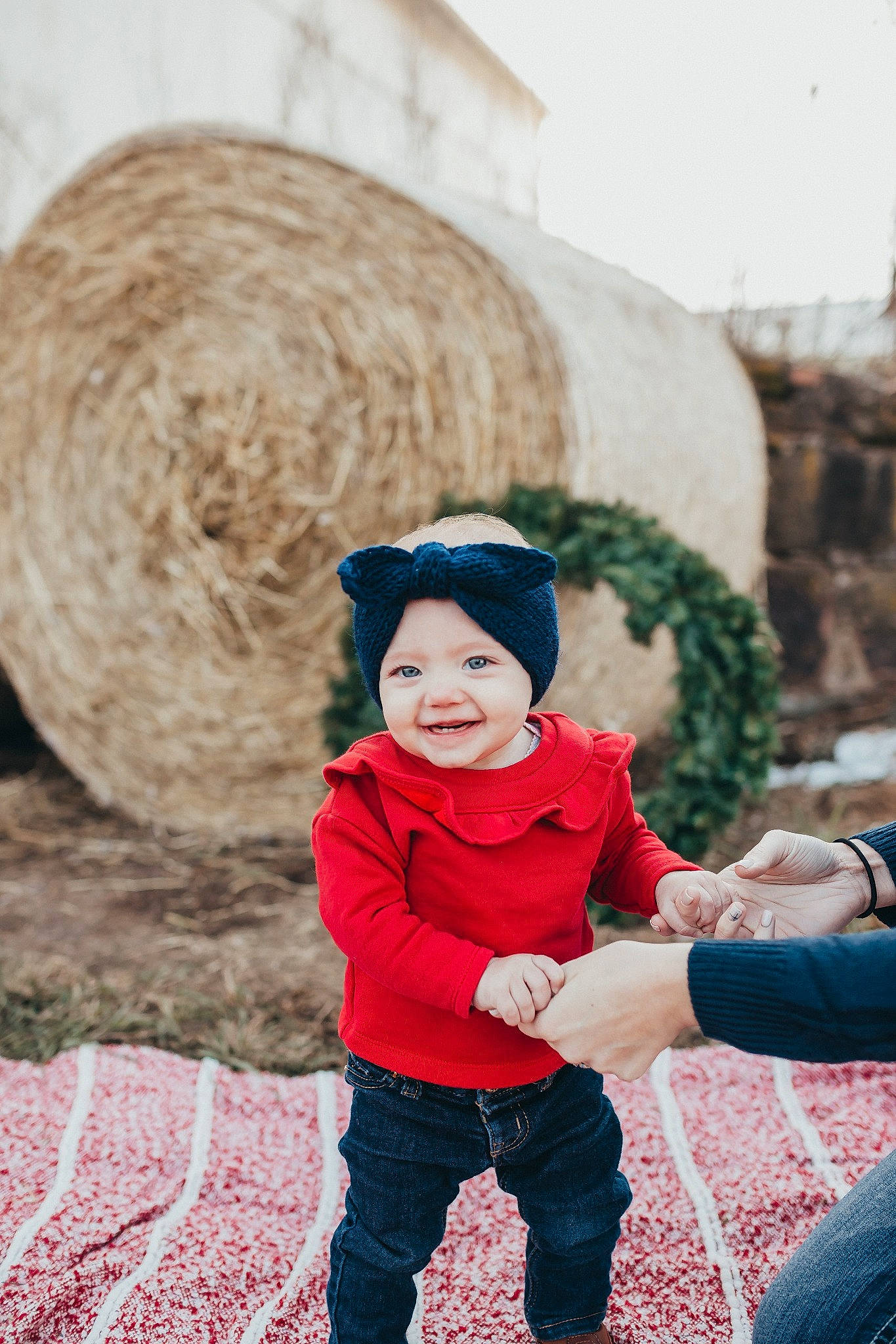 Adilynn is registered to the contest to win money with this photo: baby, beauty, child, child_model, eye, family, happy, headgear, joy, outerwear, people, person, photograph, photography, portrait_photography, red, sitting, skin, smile, toddler