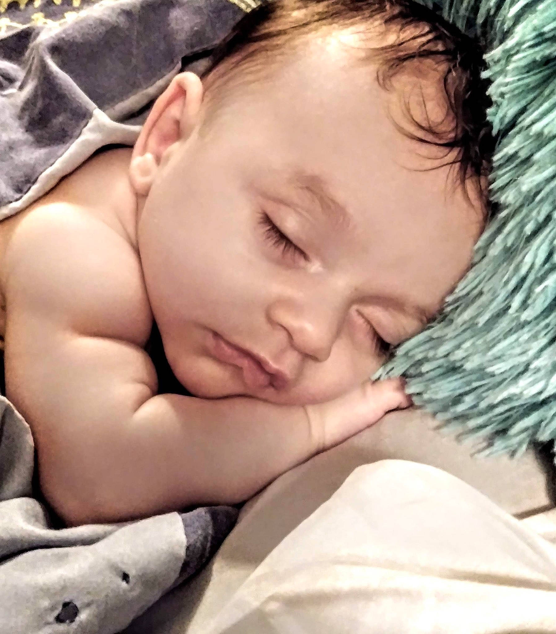 Braylin is registered to the contest to win money with this photo: arm, baby, baby_sleeping, beauty, cheek, child, close_up, face, forehead, gesture, hand, head, mouth, muscle, nap, neck, nose, person, skin, sleep