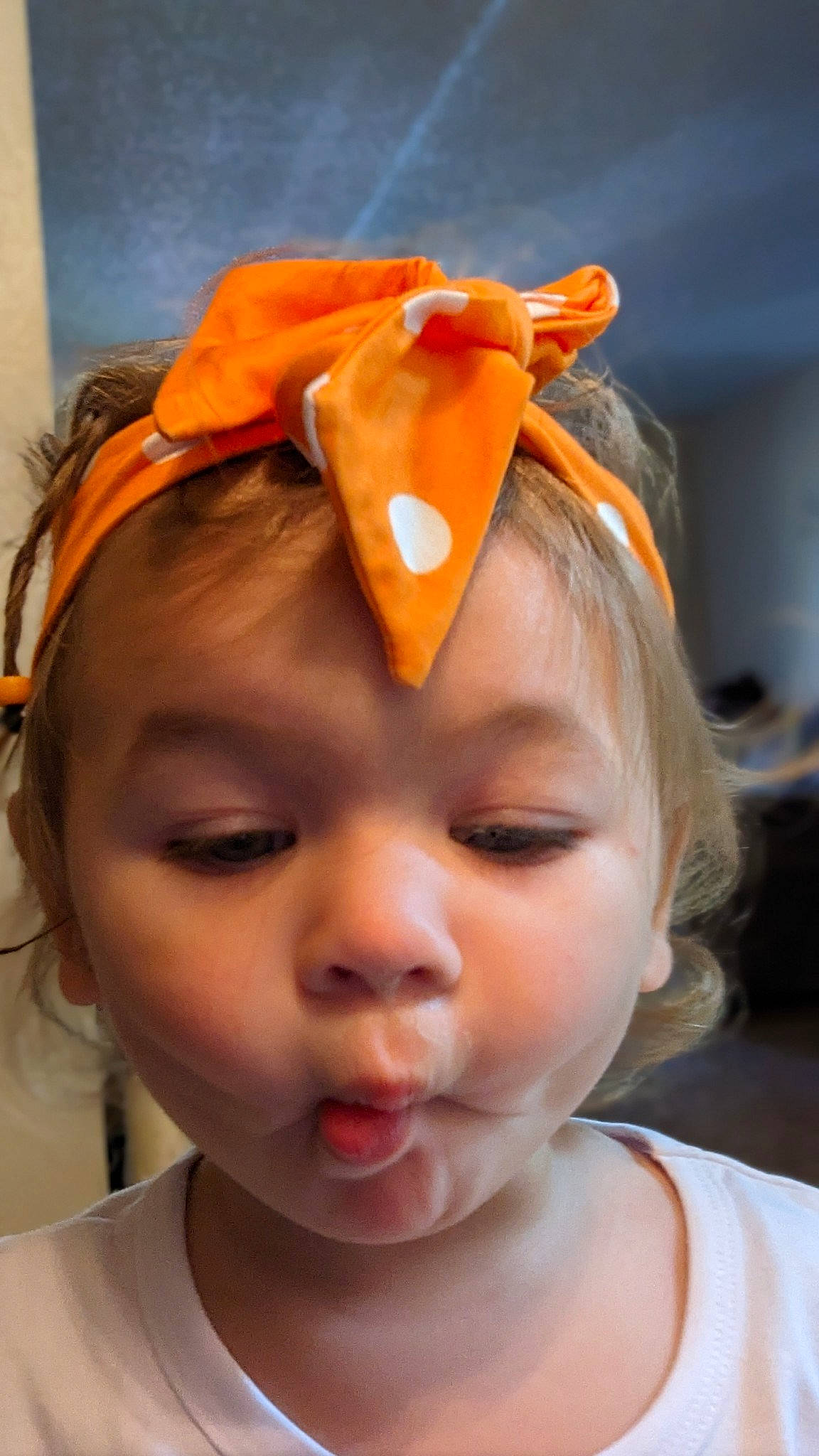 Lilah is registered to the contest to win money with this photo: baby, baby_toddler_clothing, beauty, cheek, child, costume_hat, ear, eye, eyebrow, eyelash, fashion_accessory, fun, hair_accessory, hair_tie, happy, headband, headgear, headpiece, iris, person