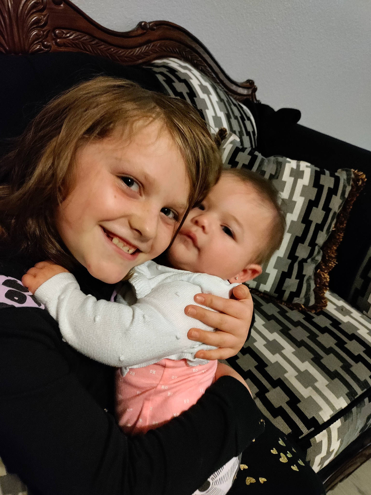 Abbiegail is registered to the contest to win money with this photo: baby, baby_toddler_clothing, cheek, child, comfort, couch, eye, face, flash_photography, fun, gesture, happy, head, iris, joy, pattern, person, sitting, skin, sleeve