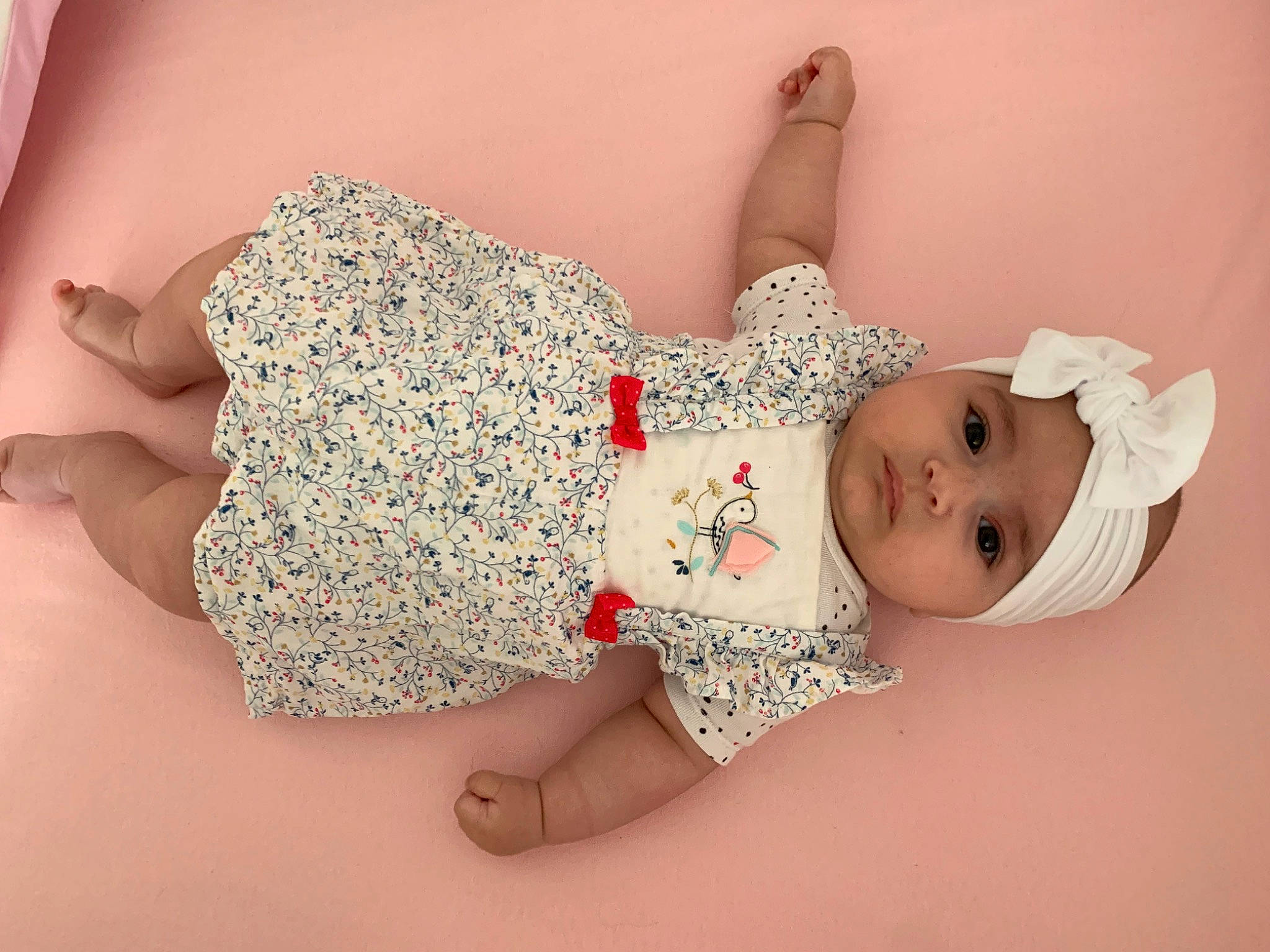 Selena a rejoint le concours — aidez-le/la à gagner de superbes lots ! arm, baby, baby_toddler_clothing, day_dress, doll, dress, hand, headgear, headwear, human_body, human_leg, joint, leg, pattern, person, pink, skin, sleeve, textile, thigh