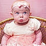 Caydence is registered to the contest to win money with this photo: baby, bonnet, clothing, crib, doll, dress, face, flower, flowerarrangement, formalwear, furniture, hat, head, infantbed, newborn, person, photography, portrait, sitting, toy