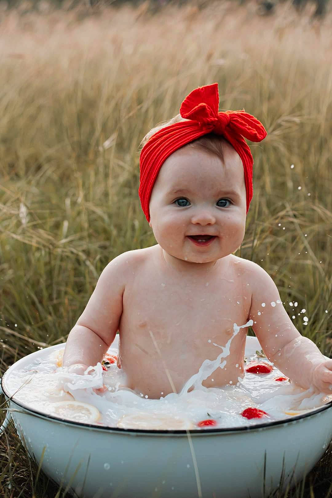 Joelle is registered to the contest to win money with this photo: baby, baby_laughing, baby_toddler_clothing, cap, child, face, fashion_accessory, fun, grass, happy, headgear, joy, leisure, lip, people_in_nature, person, photograph, recreation, skin, smile