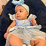 Samadhi is registered to the contest to win money with this photo: baby, child, blue_dress, headband, sitting, plush_chair, indoor, cute, portrait, young_child, adorable, soft_toys, fashion, infant, closeup, skin, person, cute_outfit, headwear, baby_accessories