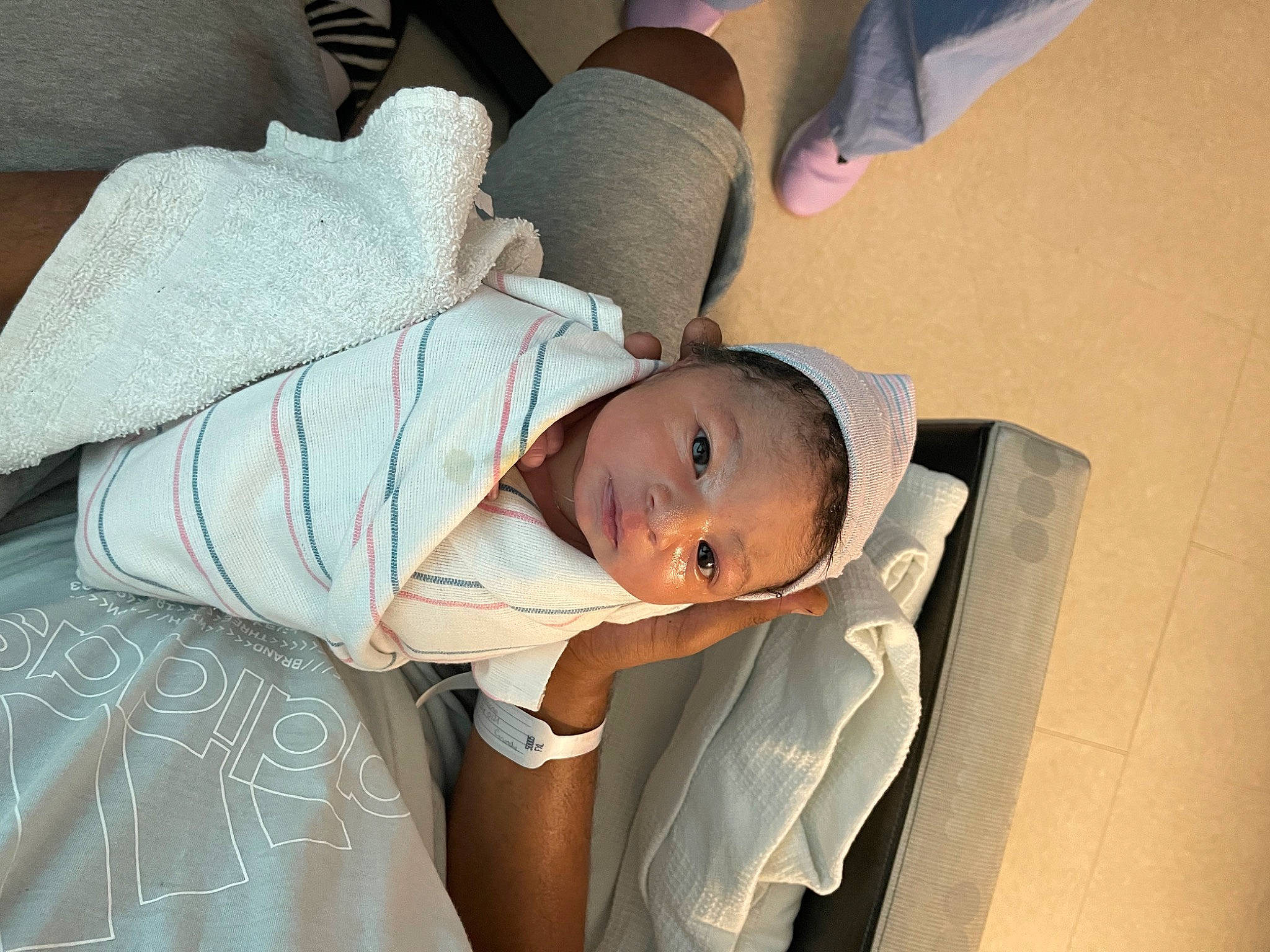 Taten joined the competition — help win amazing prizes! baby, baby_products, baby_toddler_clothing, child, comfort, elbow, flooring, gesture, hat, human_leg, linens, nap, person, room, sitting, sleep, sleeve, toddler