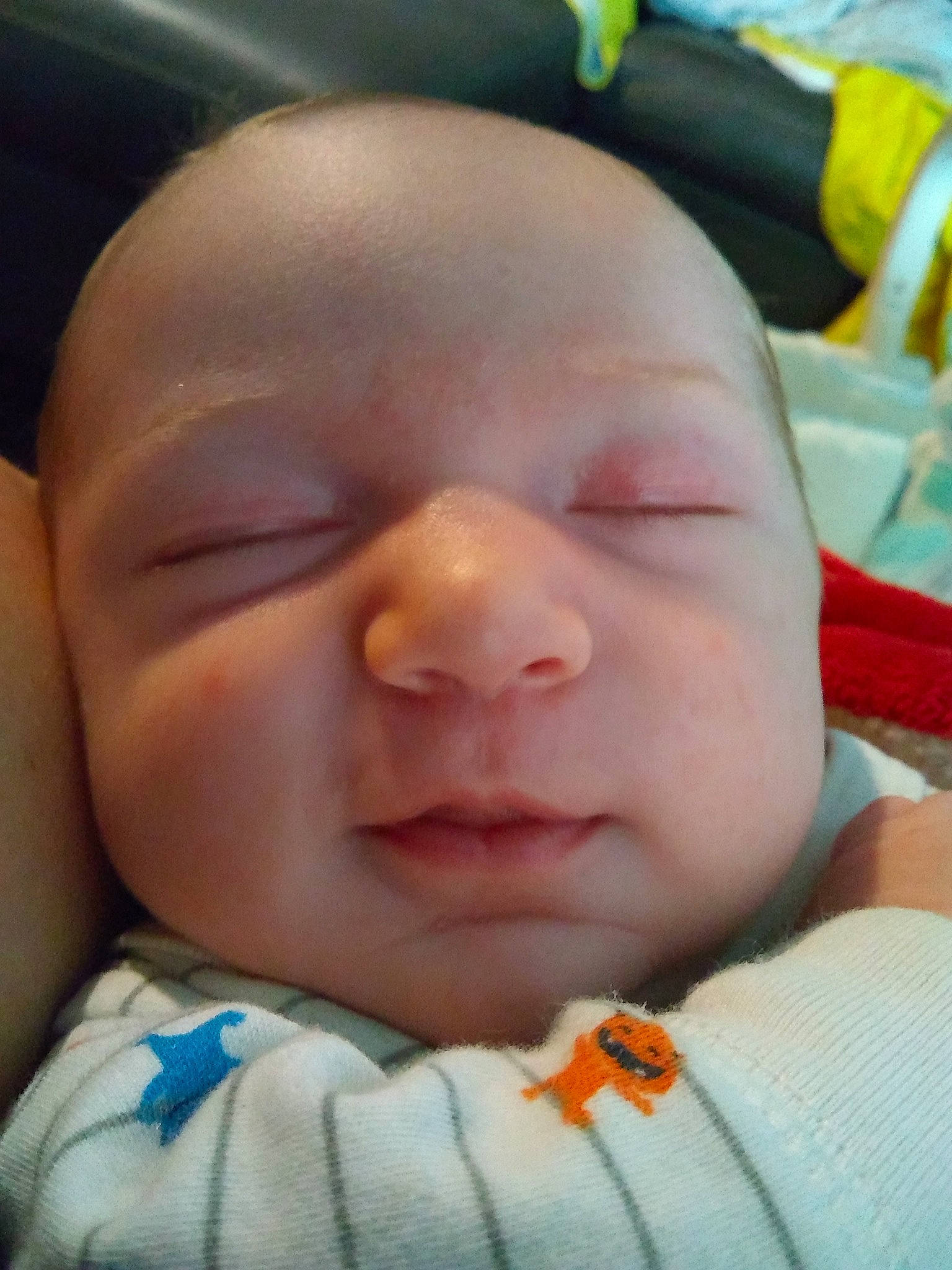 Lincoln is registered to the contest to win money with this photo: bedtime, cheek, child, chin, close_up, eye, eyebrow, face, finger, forehead, hand, head, infant, lip, mouth, nap, nose, person, skin, sleep