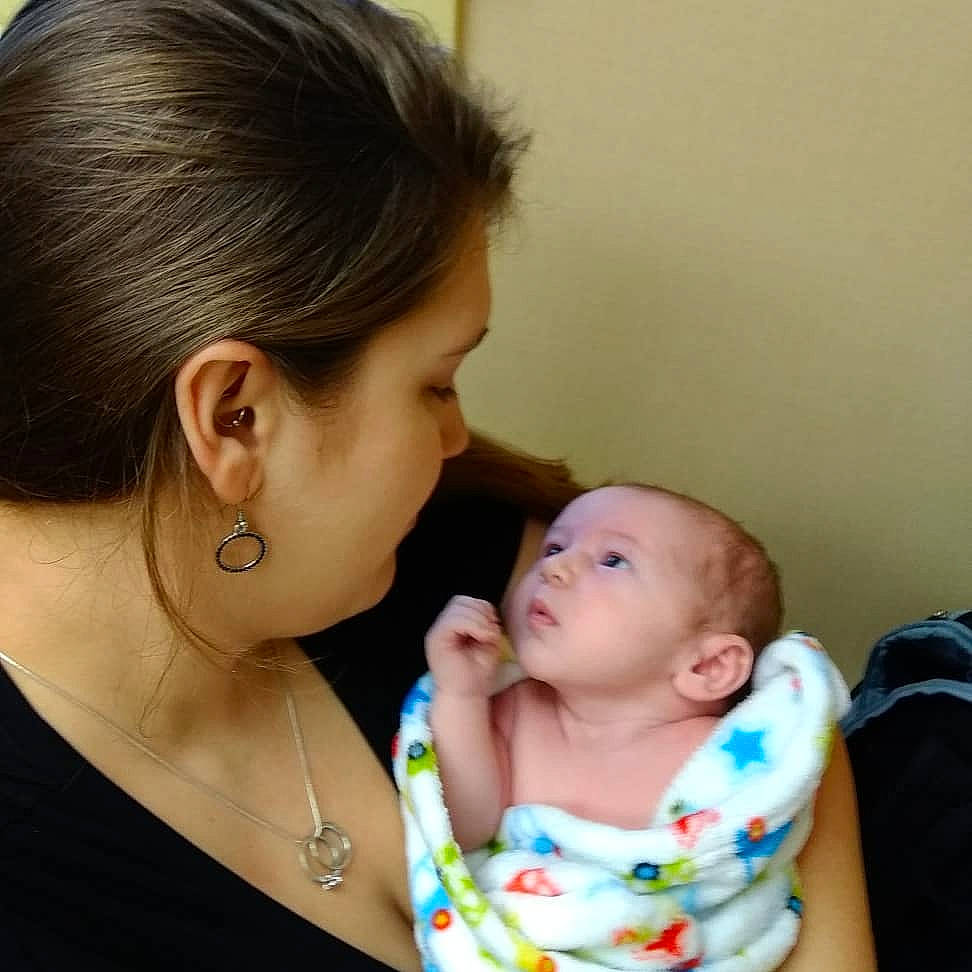 Lincoln is registered to the contest to win money with this photo: cheek, child, ear, girl, infant, mother, neck, person, product, toddler