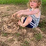 child, toddler, barefoot, sitting, dirt, grass, outdoor, nature, trees, summer, play, pointing, tank_top, shorts, blonde_hair, smiling, daylight, field, shadow, casual