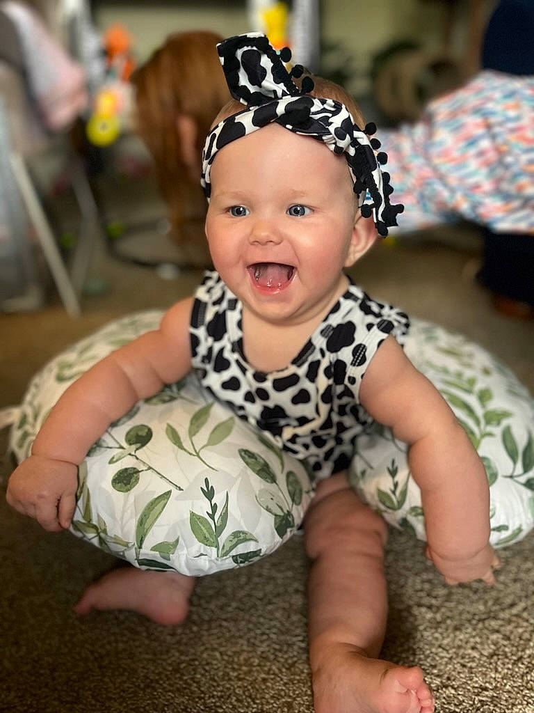 Chevelle joined the competition — help win amazing prizes! baby, baby_toddler_clothing, child, costume_hat, fashion_accessory, flooring, foot, fun, grass, hair_accessory, happy, headband, headpiece, headwear, jewellery, joy, party_supply, pattern, person, sitting