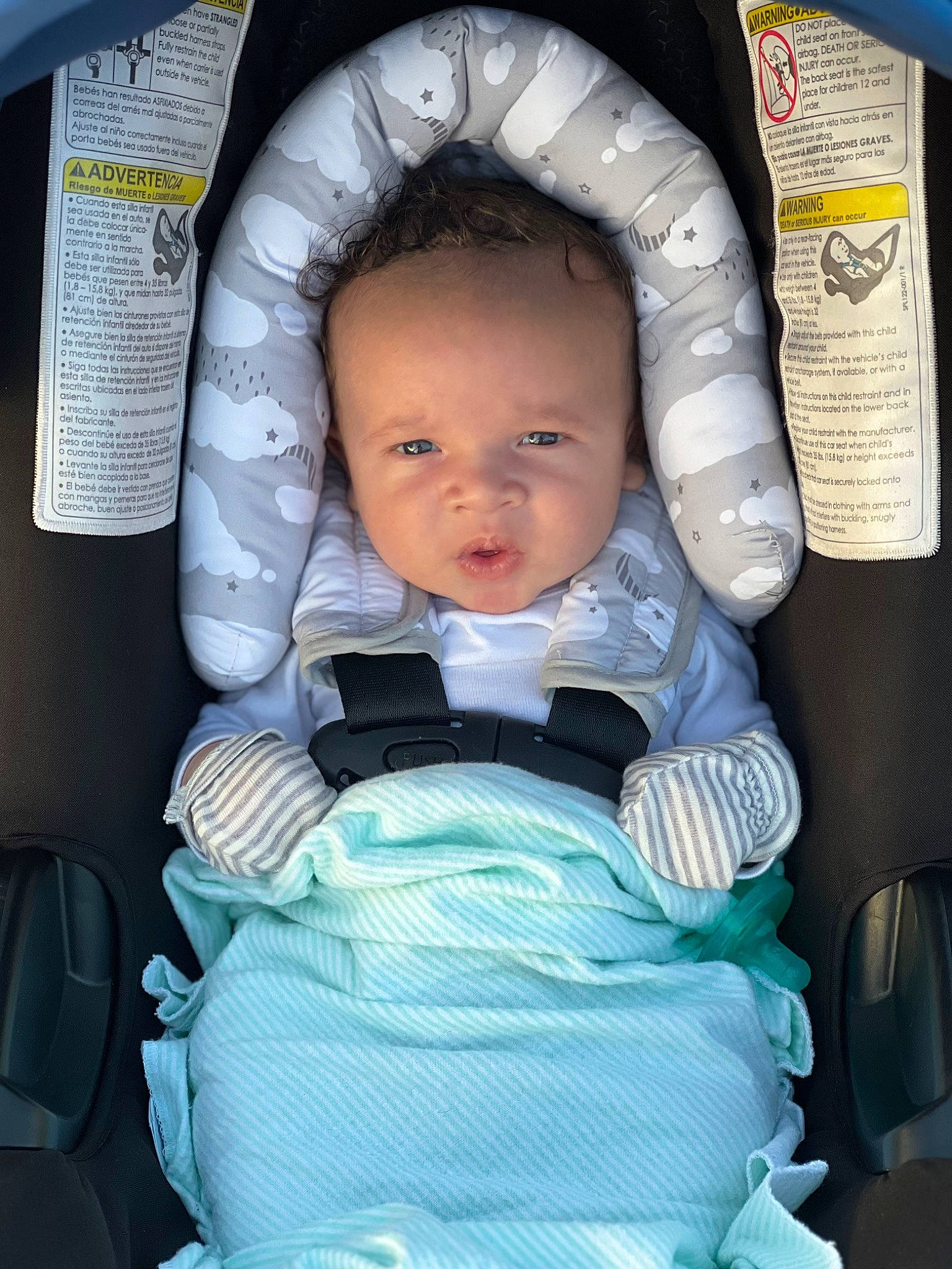 Brice is registered to the contest to win money with this photo: auto_part, baby, baby_carriage, baby_in_car_seat, baby_products, baby_safety, baby_toddler_clothing, blue, car_seat, cheek, chin, comfort, eye, facial_expression, iris, mouth, nose, person, product, skin