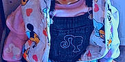 Madeleine a rejoint le concours — aidez-le/la à gagner de superbes lots ! accessories, baby, bag, clothing, coat, couch, doll, face, furniture, handbag, head, jacket, jeans, knitwear, pants, person, photography, portrait, sweater, toy