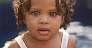 Tori Jones joined the competition — help win amazing prizes! child, toddler, curly_hair, water_droplets, colorful_clothing, summer, outdoor, portrait, closeup, expression, skin, face, eyes, natural_light, blurred_background, person, cute, young_child, sunlight, tank_top