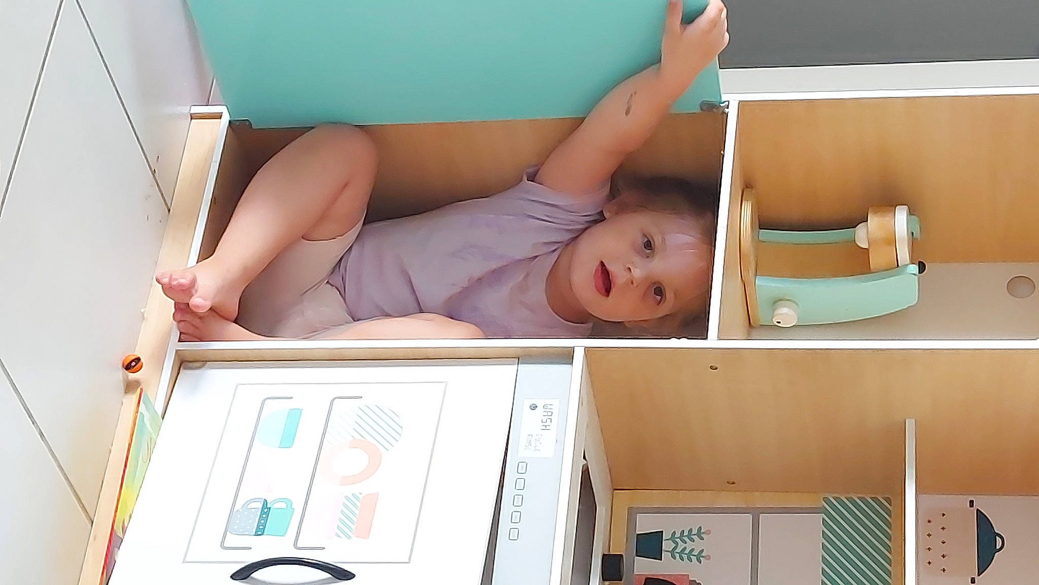 Nya is registered to the contest to win money with this photo: abdomen, art, baby, baby_products, baby_safety, chest, child, comfort, diaper, elbow, finger, human_leg, knee, leg, person, product, room, stomach, textile, thigh