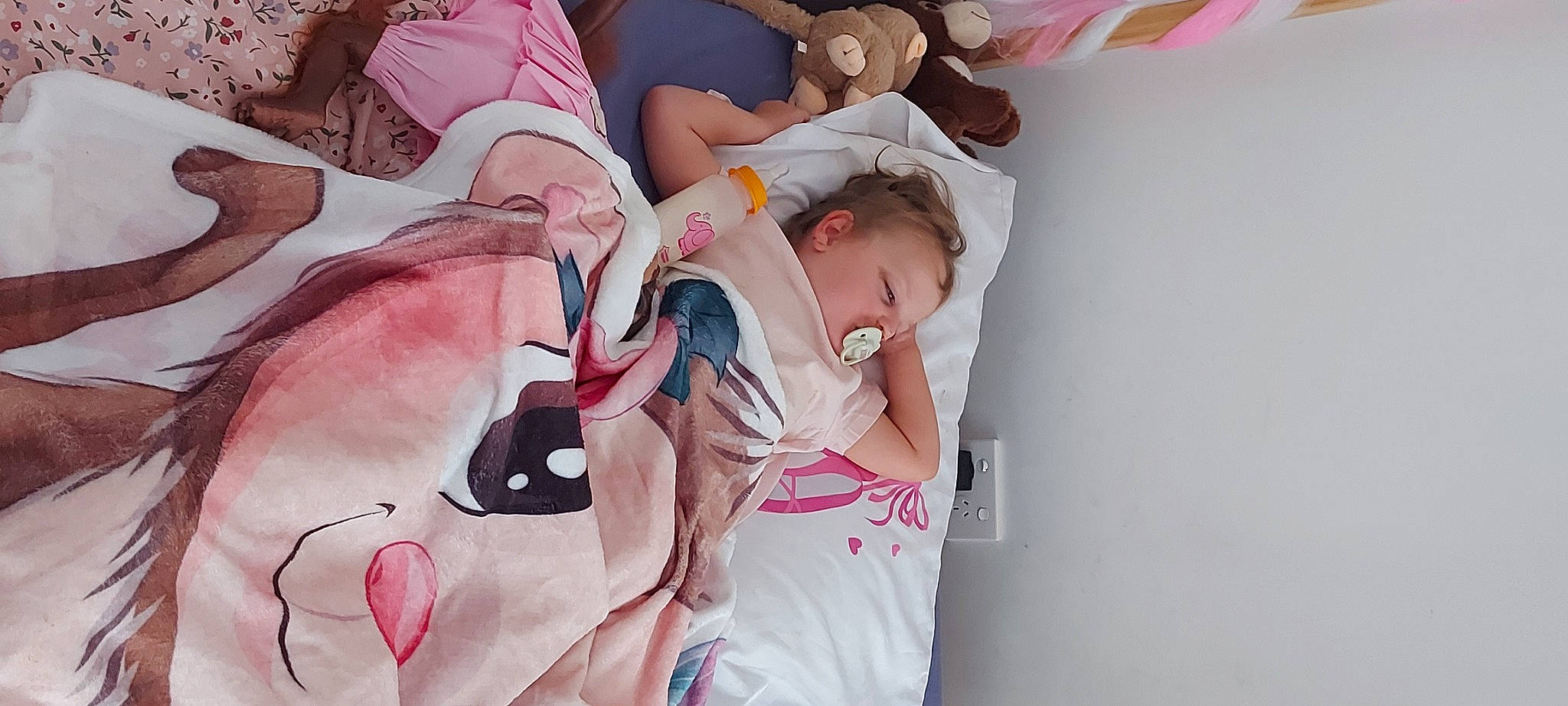 Ava is registered to the contest to win money with this photo: art, baby, baby_products, baby_toddler_clothing, carmine, child, comfort, event, eyelash, finger, flesh, happy, linens, magenta, pattern, peach, person, pink, room, skin