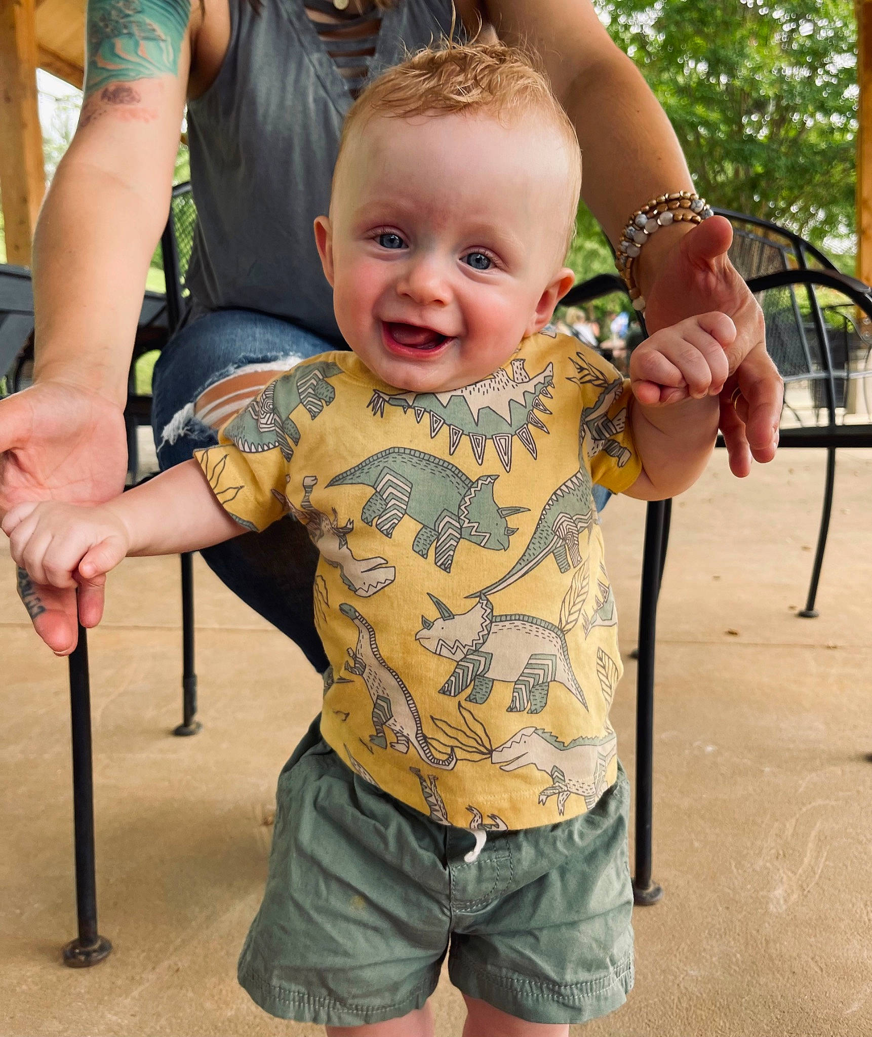Brodie is registered to the contest to win money with this photo: cheek, face, gesture, grass, hand, happy, joint, joy, leg, leisure, people, person, photograph, shorts, skin, sleeve, smile, summer, t_shirt, thumb