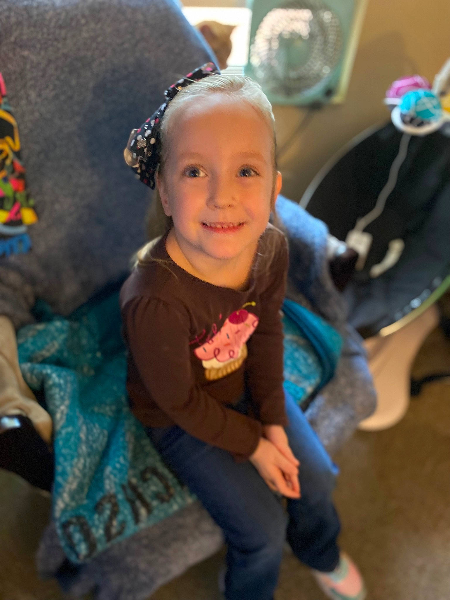 Charlotte is registered to the contest to win money with this photo: baby, child, cool, costume, event, facial_expression, fashion_accessory, fun, happy, head, iris, joy, laugh, leisure, person, play, sitting, skin, smile, toddler