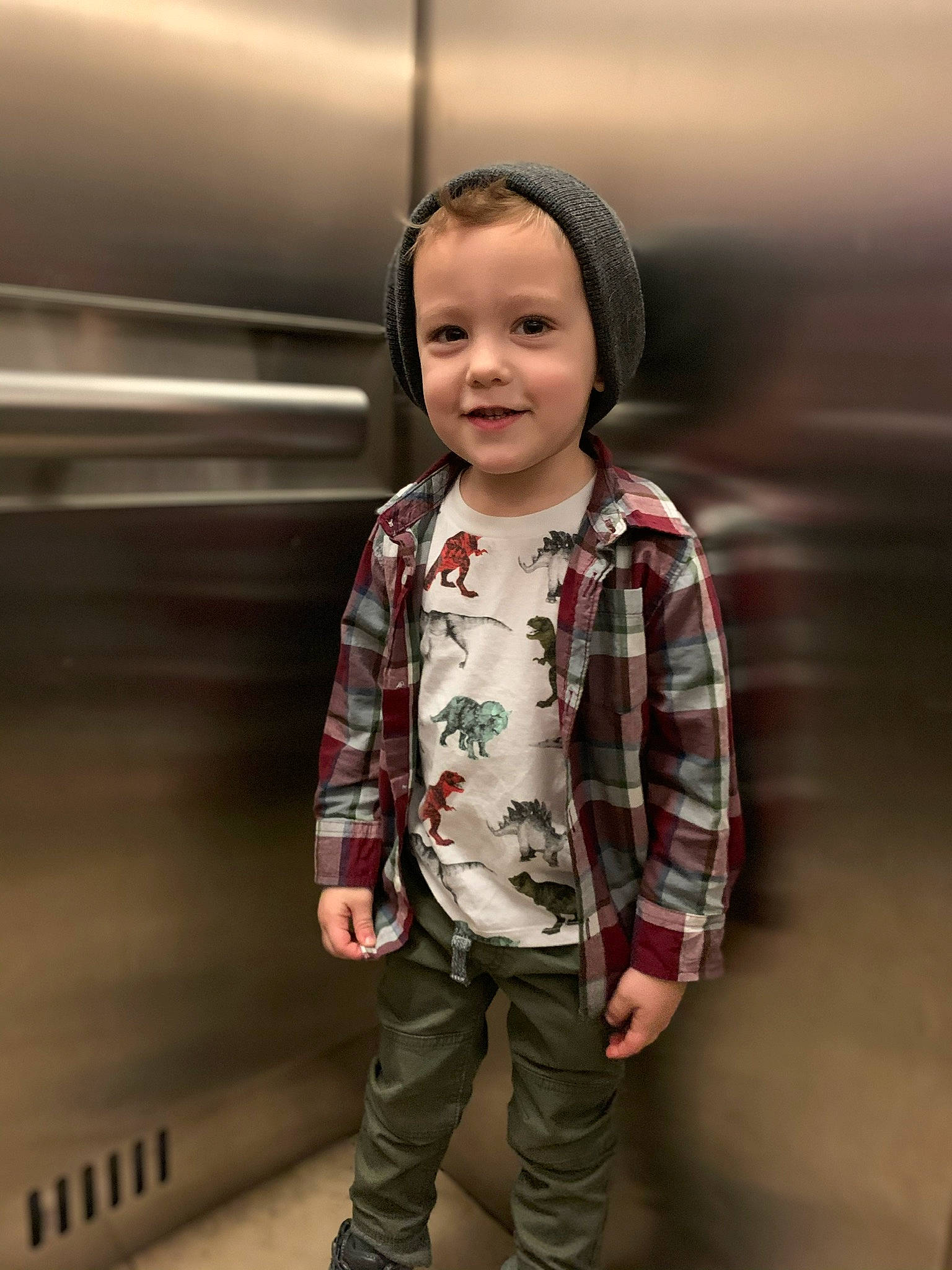 Derek is registered to the contest to win money with this photo: cheek, child, child_model, cool, face, fun, head, jacket, joy, outerwear, person, photography, skin, sleeve, smile, standing, t_shirt, toddler