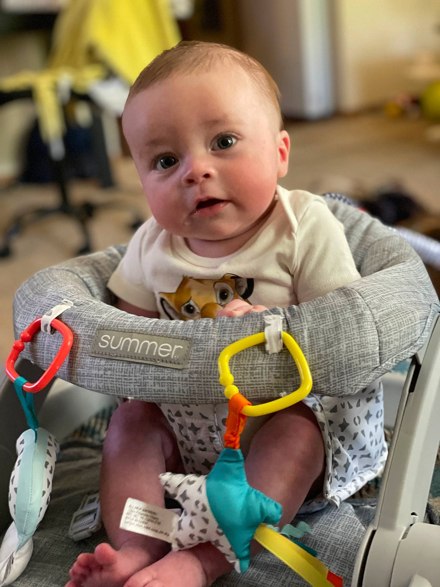 Chandler joined the competition — help win amazing prizes! baby, baby_carriage, baby_products, baby_toddler_clothing, chair, cheek, child, comfort, facial_expression, finger, fun, happy, lap, mouth, nail, person, sitting, skin, thumb, toddler
