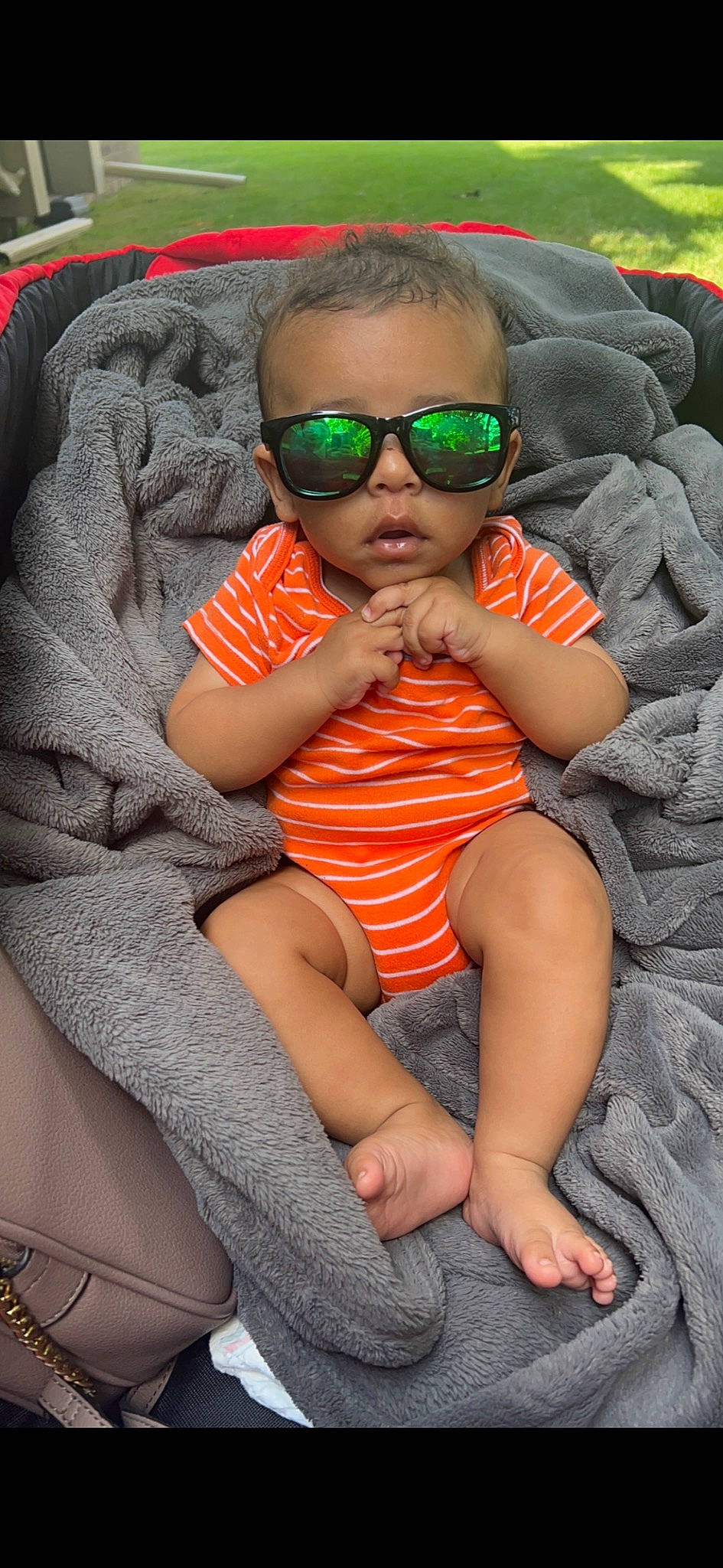 Franklin is registered to the contest to win money with this photo: baby_toddler_clothing, cool, eyewear, face, facial_expression, finger, glasses, goggles, hairstyle, head, leg, lip, mouth, person, photograph, pink, skin, smile, sunglasses, thigh