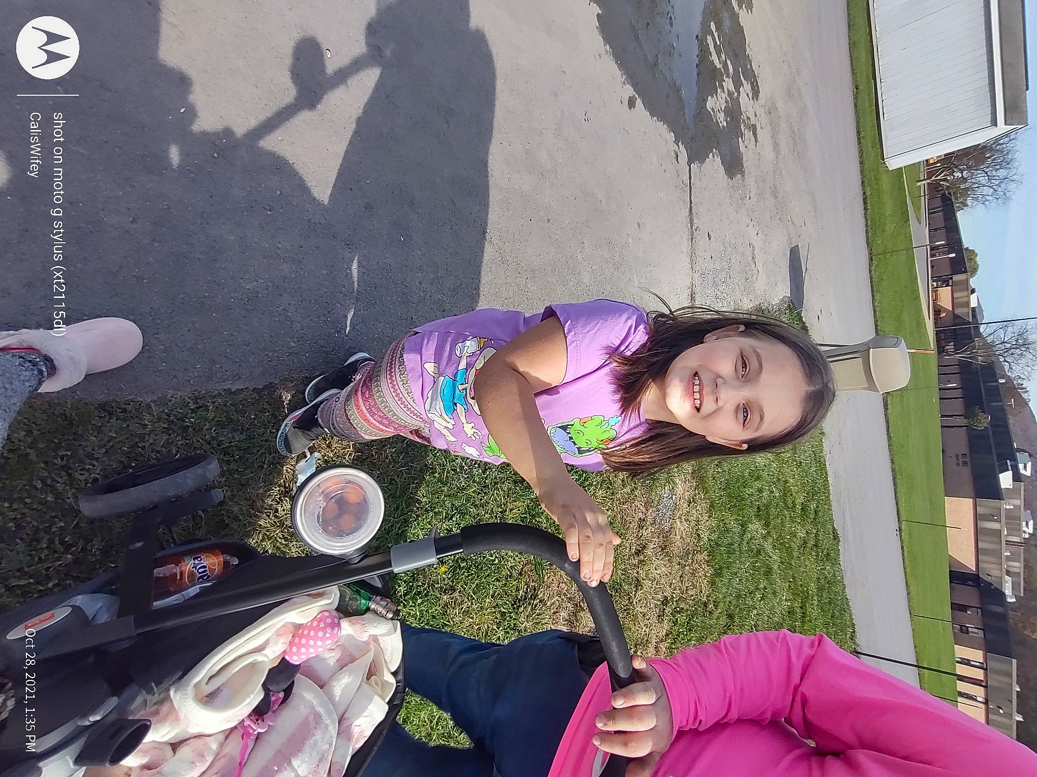 Merella is registered to the contest to win money with this photo: beauty, eyewear, fun, grass, happy, human_leg, joy, leisure, luggage_and_bags, magenta, person, photograph, pink, plant, purple, recreation, sandal, snapshot, thigh, tire