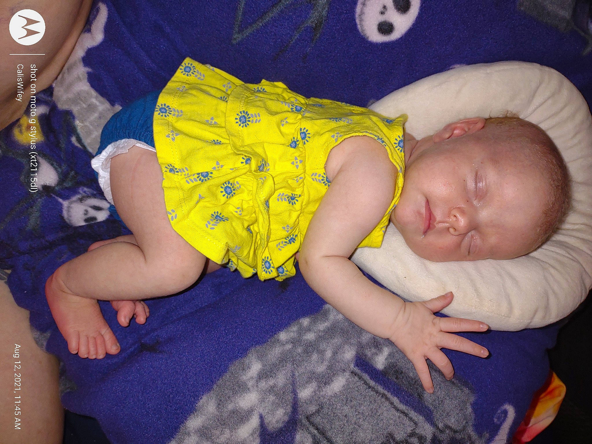 Olivia is registered to the contest to win money with this photo: abdomen, arm, baby, baby_products, baby_toddler_clothing, bedtime, cheek, child, comfort, finger, fun, happy, human_leg, lap, pattern, person, room, sitting, skin, thigh