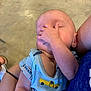 London is registered to the contest to win money with this photo: accessories, arm, baby, bodypart, bracelet, clothing, face, finger, hand, head, knee, newborn, pants, person, photography, portrait, skin, sleeping, t_shirt, yawning